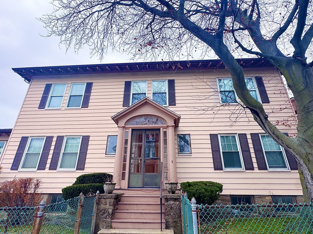 2 Mapleton Street, Unit 1 Boston, MA 02135 - Photo 2 of 8 a front view of a house