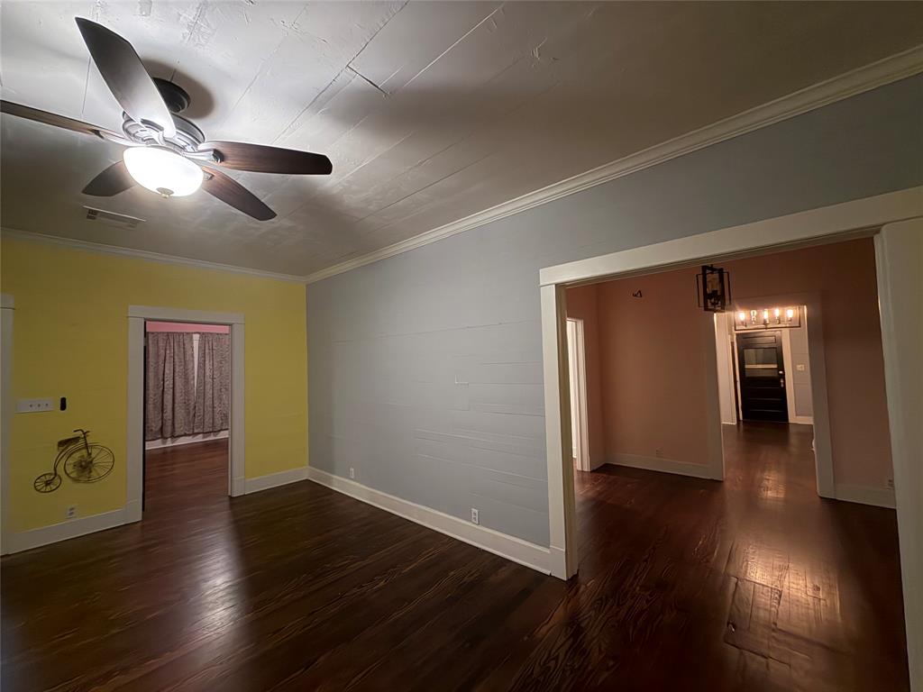 821 Ward Street Marlin, TX 76661 - Photo 11 of 22 a view of empty room with wooden floor