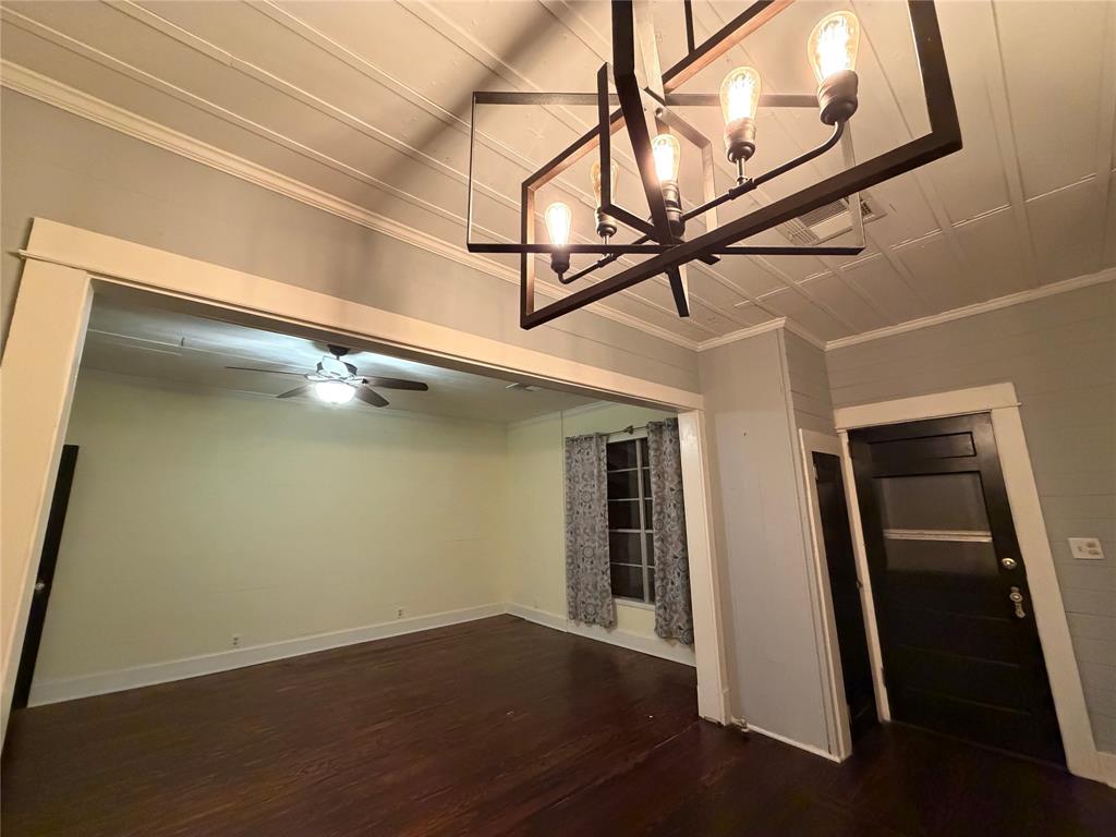 821 Ward Street Marlin, TX 76661 - Photo 18 of 22 a view of a hallway with wooden floor and door