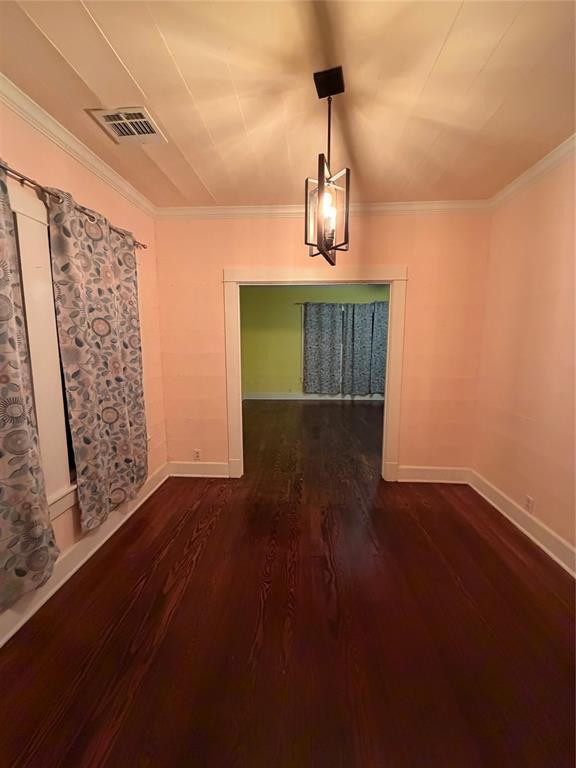821 Ward Street Marlin, TX 76661 - Photo 20 of 22 a view of empty room with wooden floor and fan