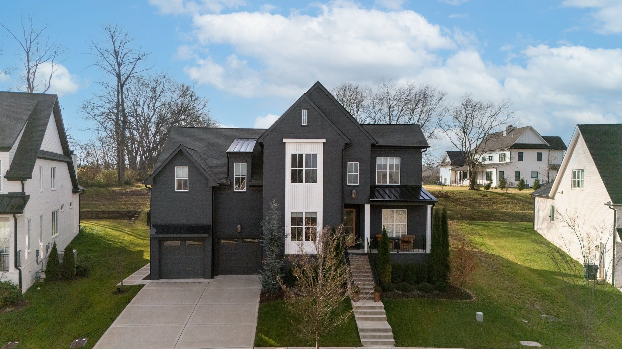 a front view of a house with yard
