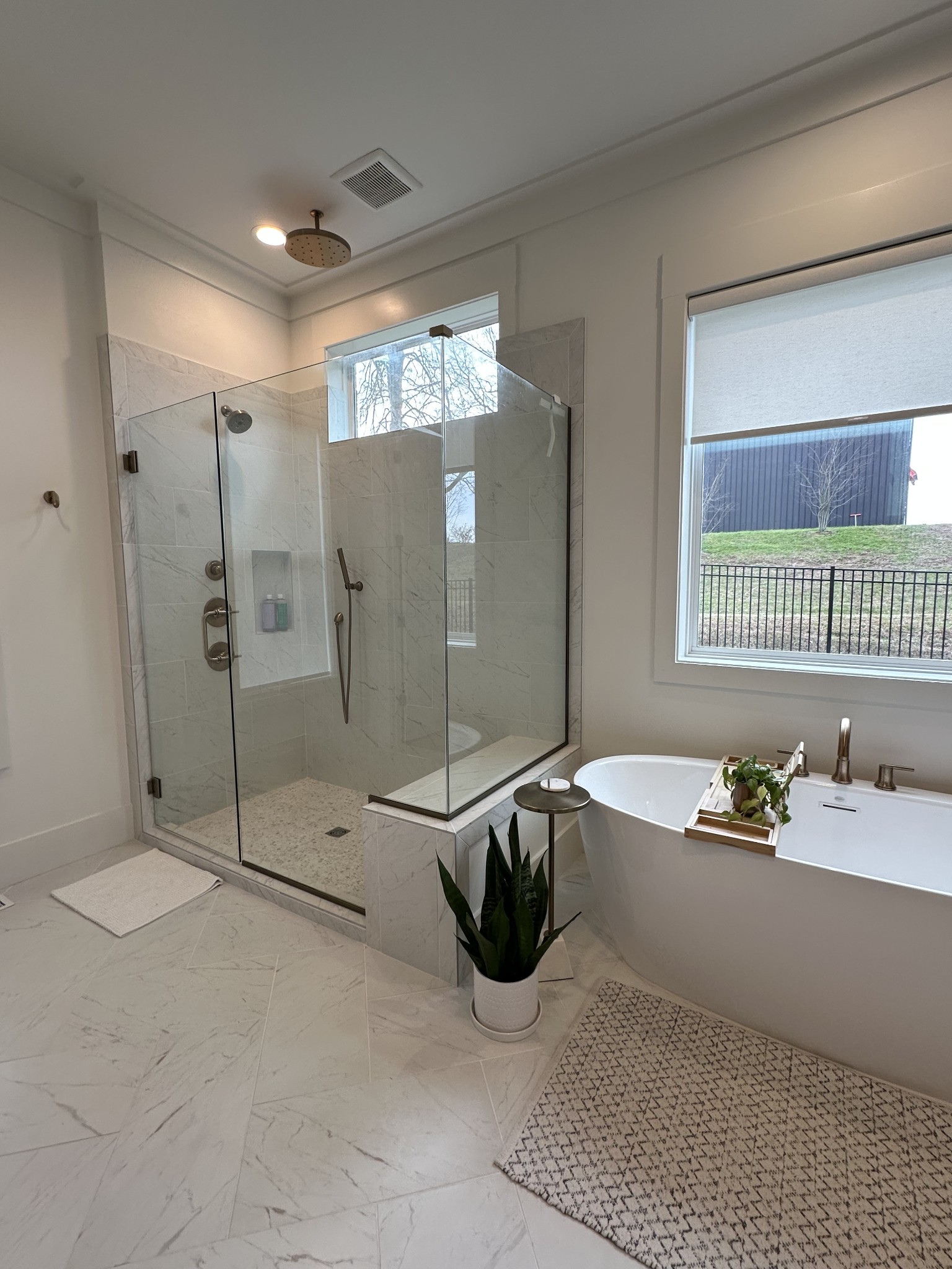 2725 Otterham Drive Thompson's Station, TN 37179 - Photo 16 of 36 a spacious bathroom with a tub sink and mirror
