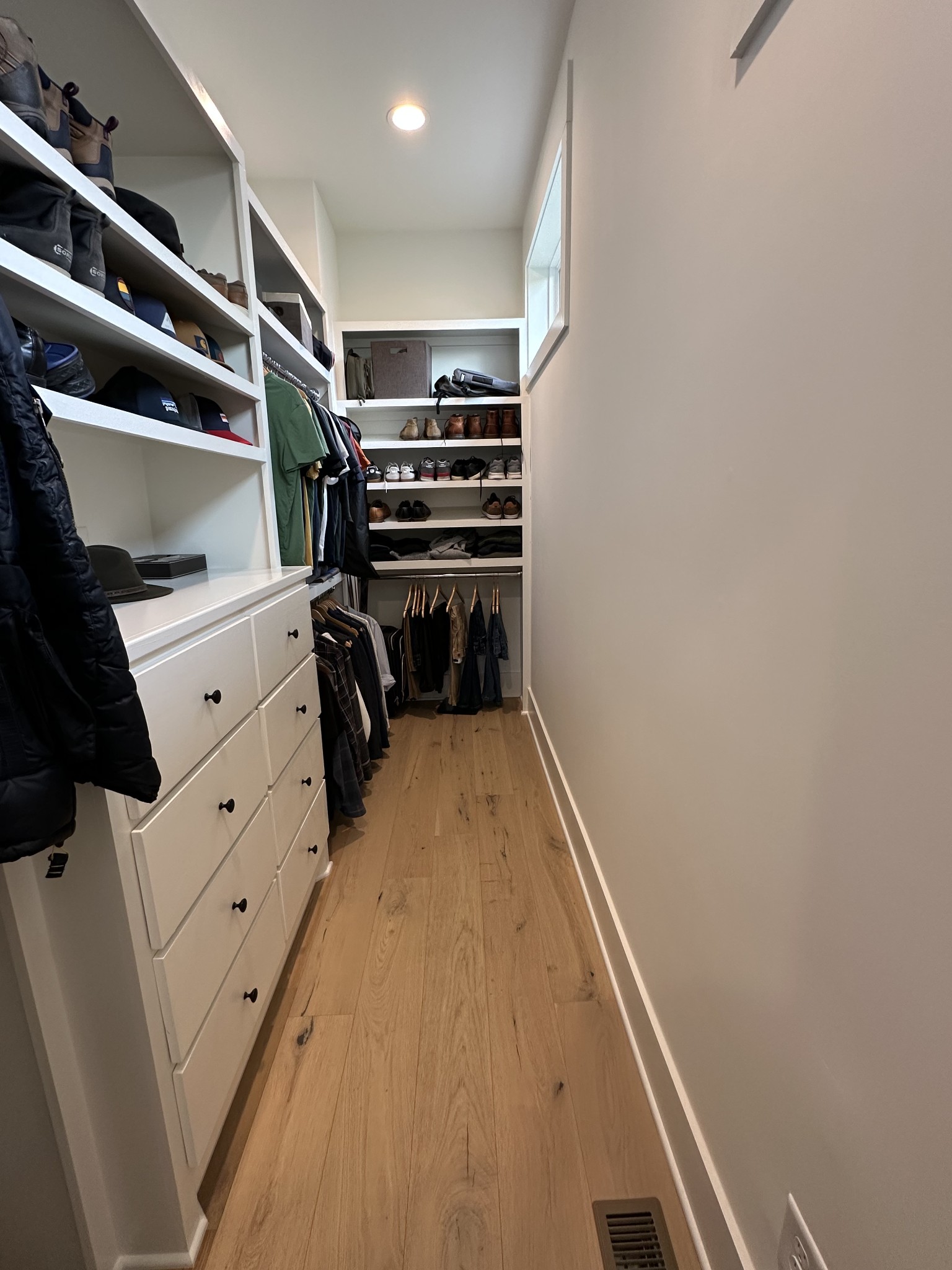 2725 Otterham Drive Thompson's Station, TN 37179 - Photo 18 of 36 a view of walk in closet with clothes and shoes