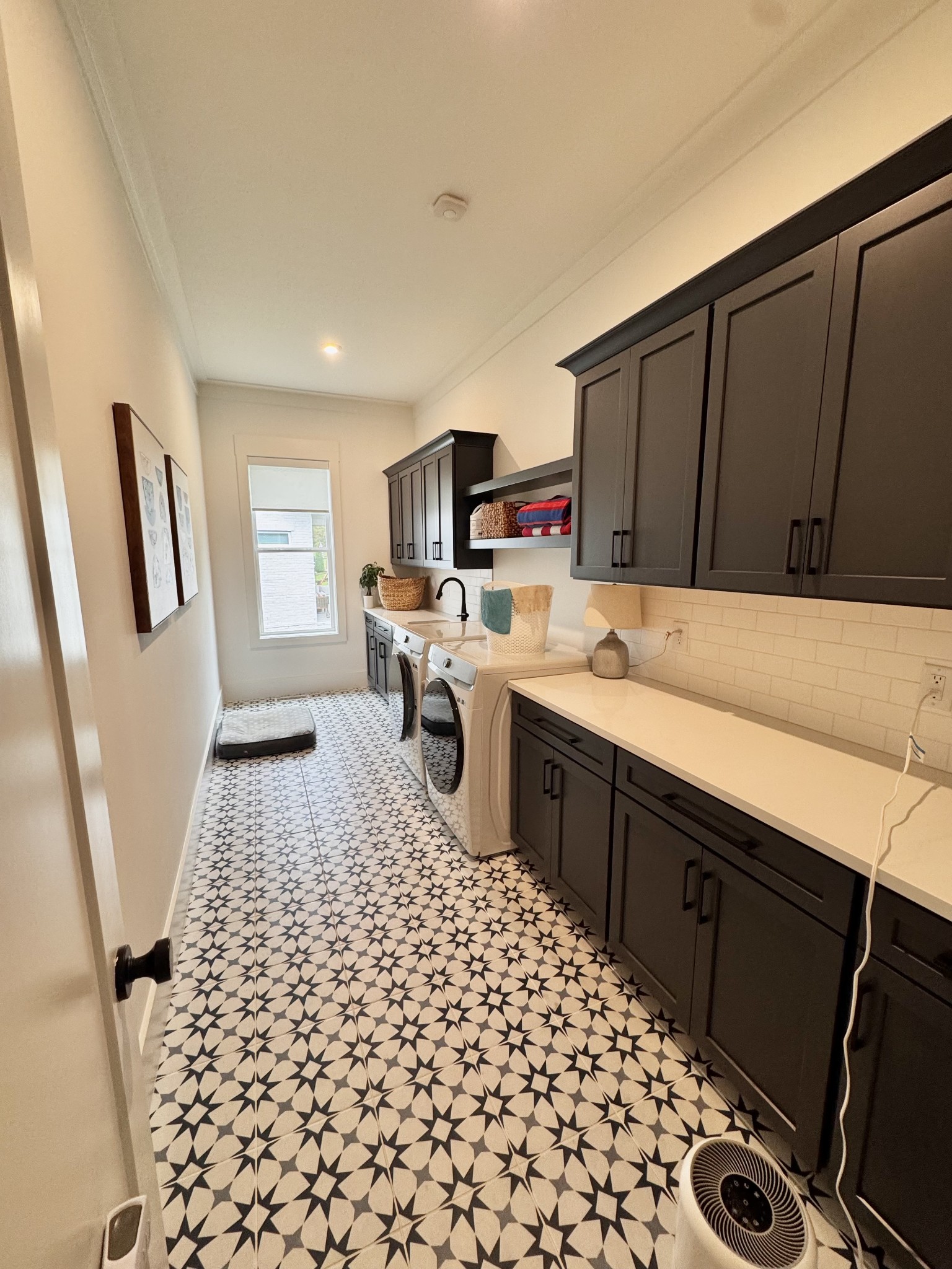 2725 Otterham Drive Thompson's Station, TN 37179 - Photo 20 of 36 a kitchen with a sink a stove a microwave and a refrigerator