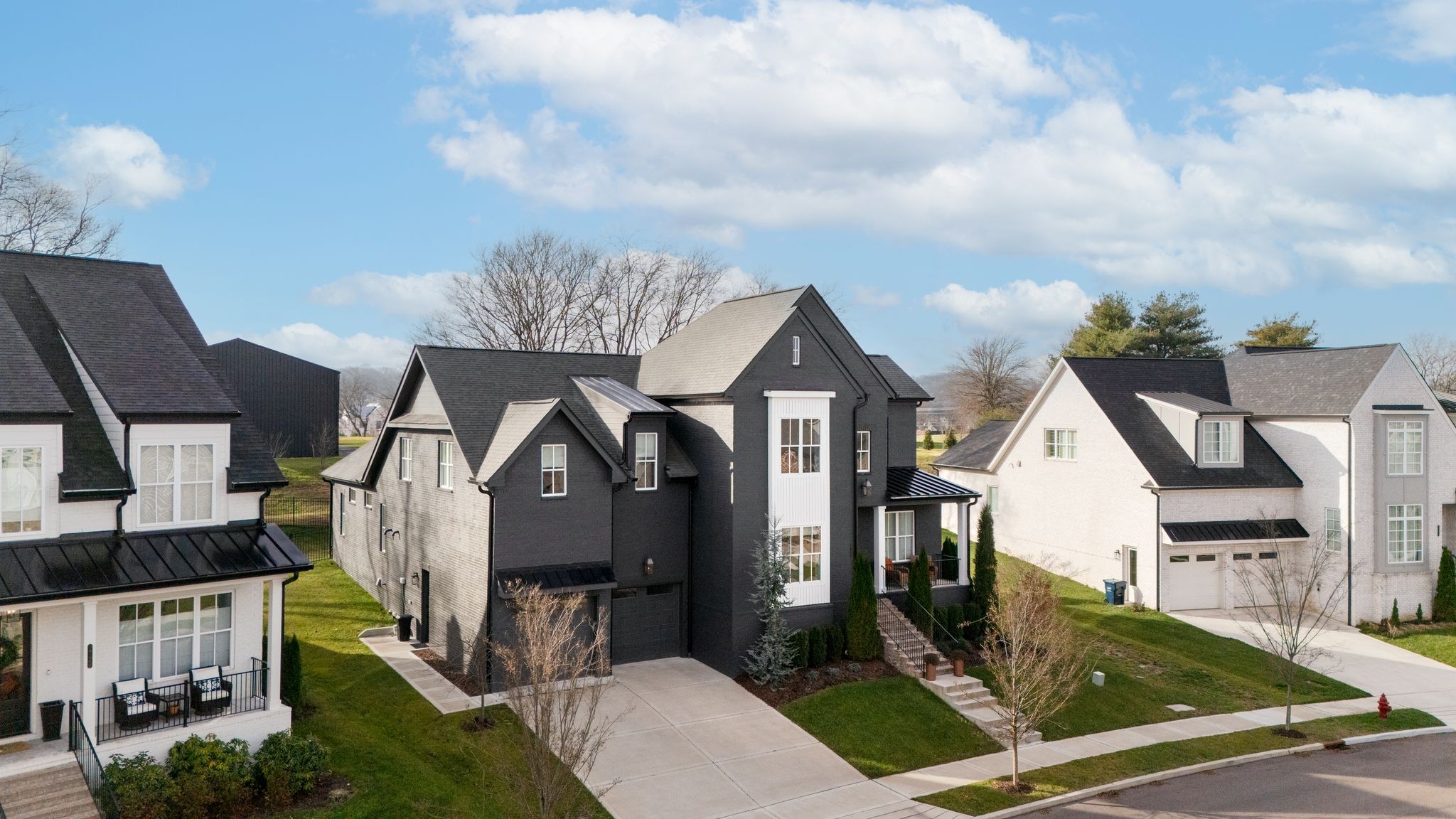 2725 Otterham Drive Thompson's Station, TN 37179 - Photo 2 of 36 a front view of a house with garden