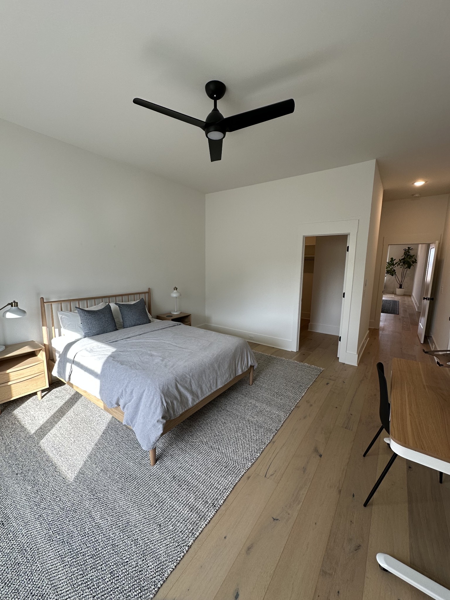 2725 Otterham Drive Thompson's Station, TN 37179 - Photo 25 of 36 a bedroom with a bed and a mirror