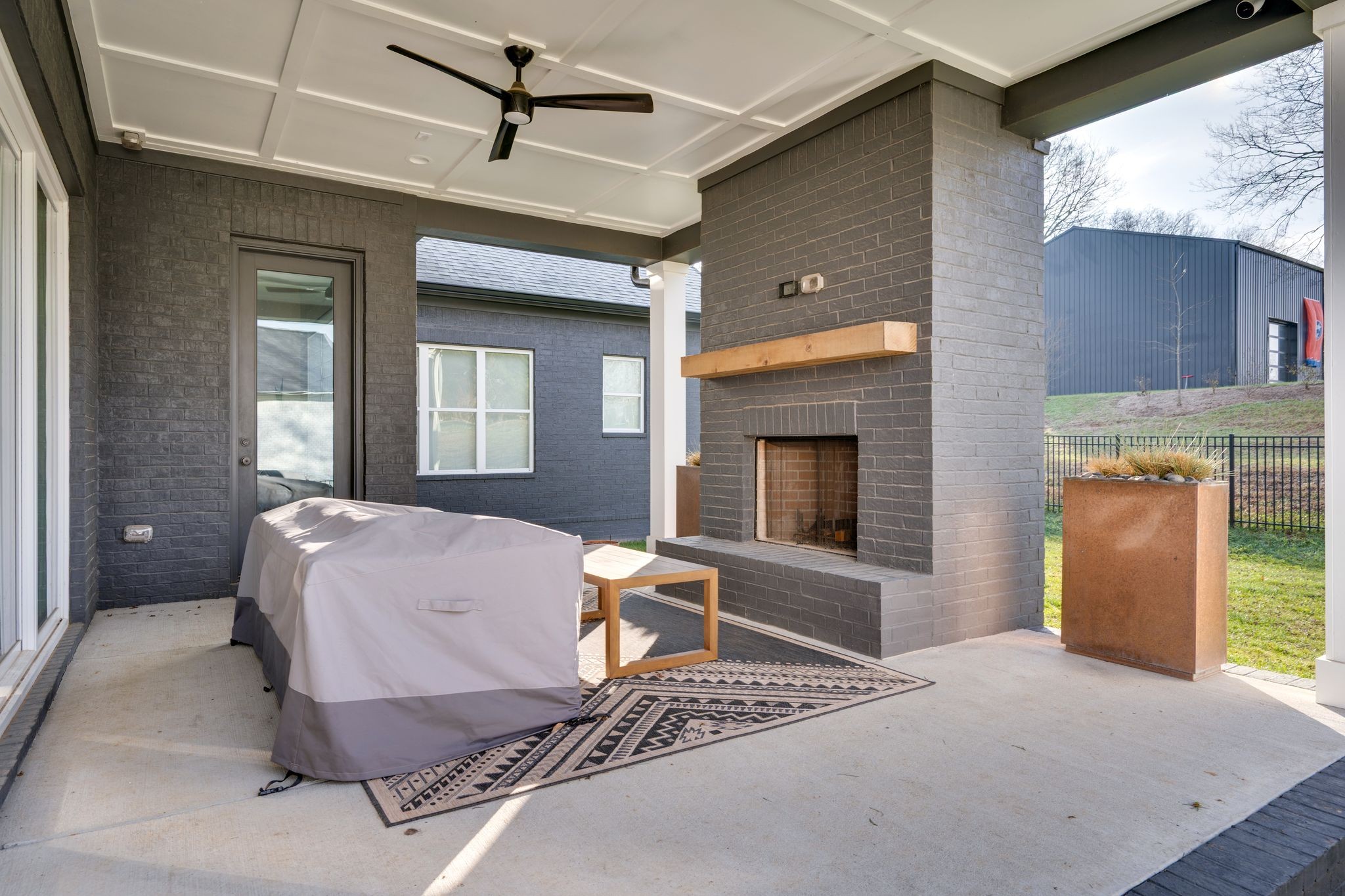 2725 Otterham Drive Thompson's Station, TN 37179 - Photo 28 of 36 a spacious bedroom with a bed and a chandelier