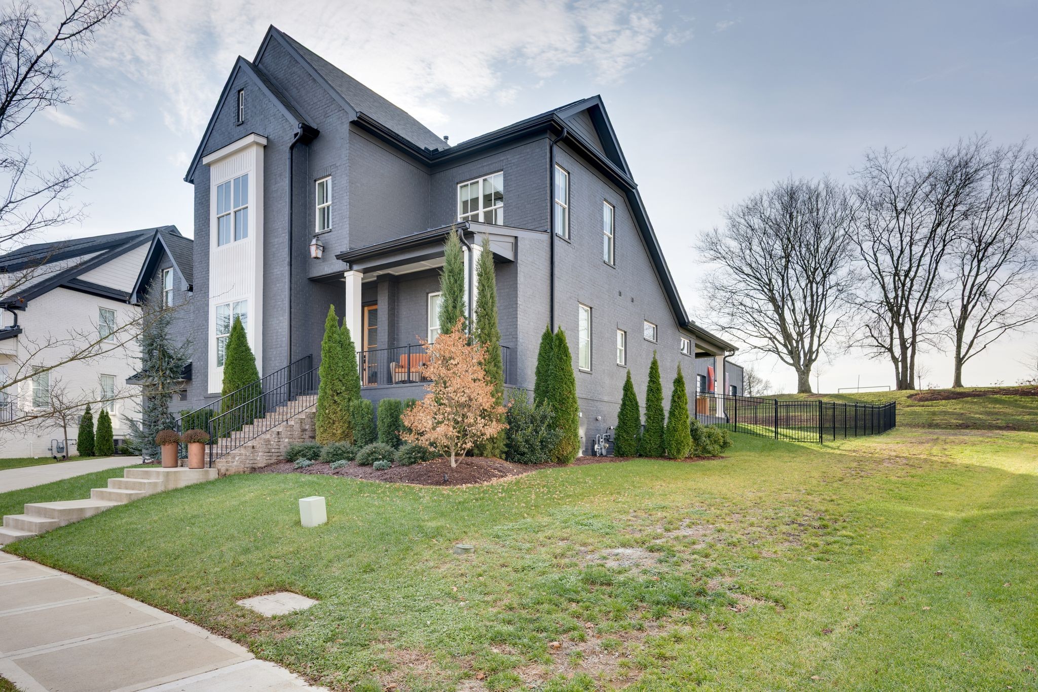 2725 Otterham Drive Thompson's Station, TN 37179 - Photo 3 of 36 a front view of house with yard and green space