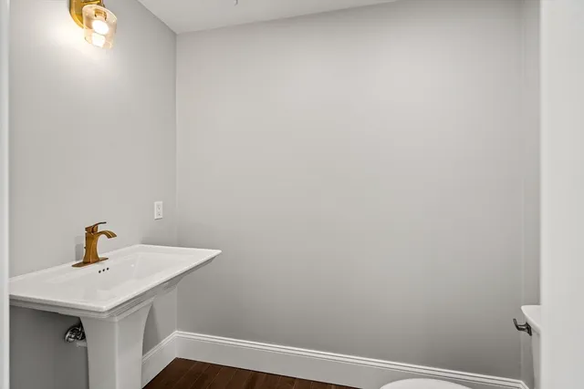 a bathroom with a sink and vanity