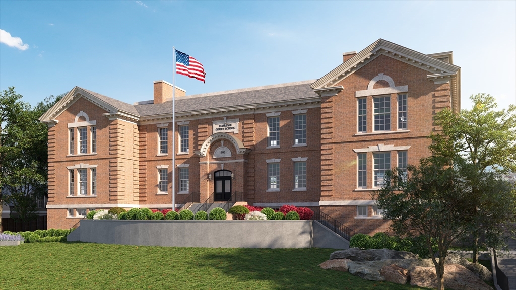 20 Mechanic Square, Unit 2 Marblehead, MA 01945 - Photo 2 of 42 a front view of a house with a yard