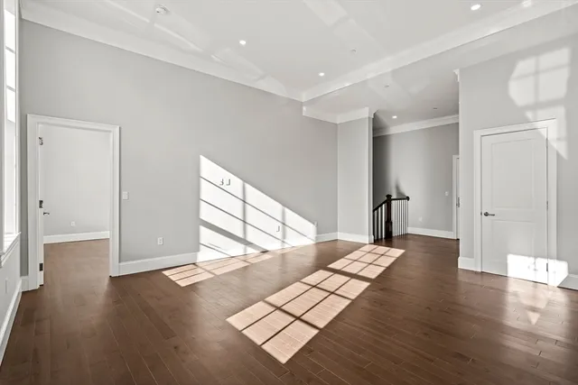 a view of entryway with wooden floor