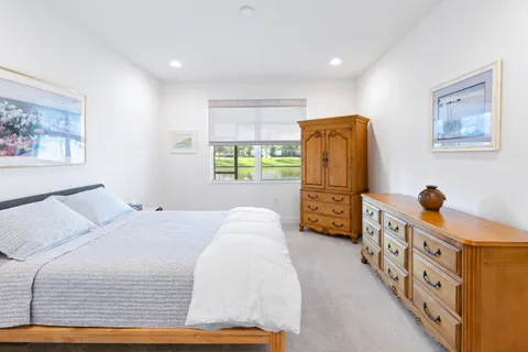 a bathroom with a sink vanity and a mirror