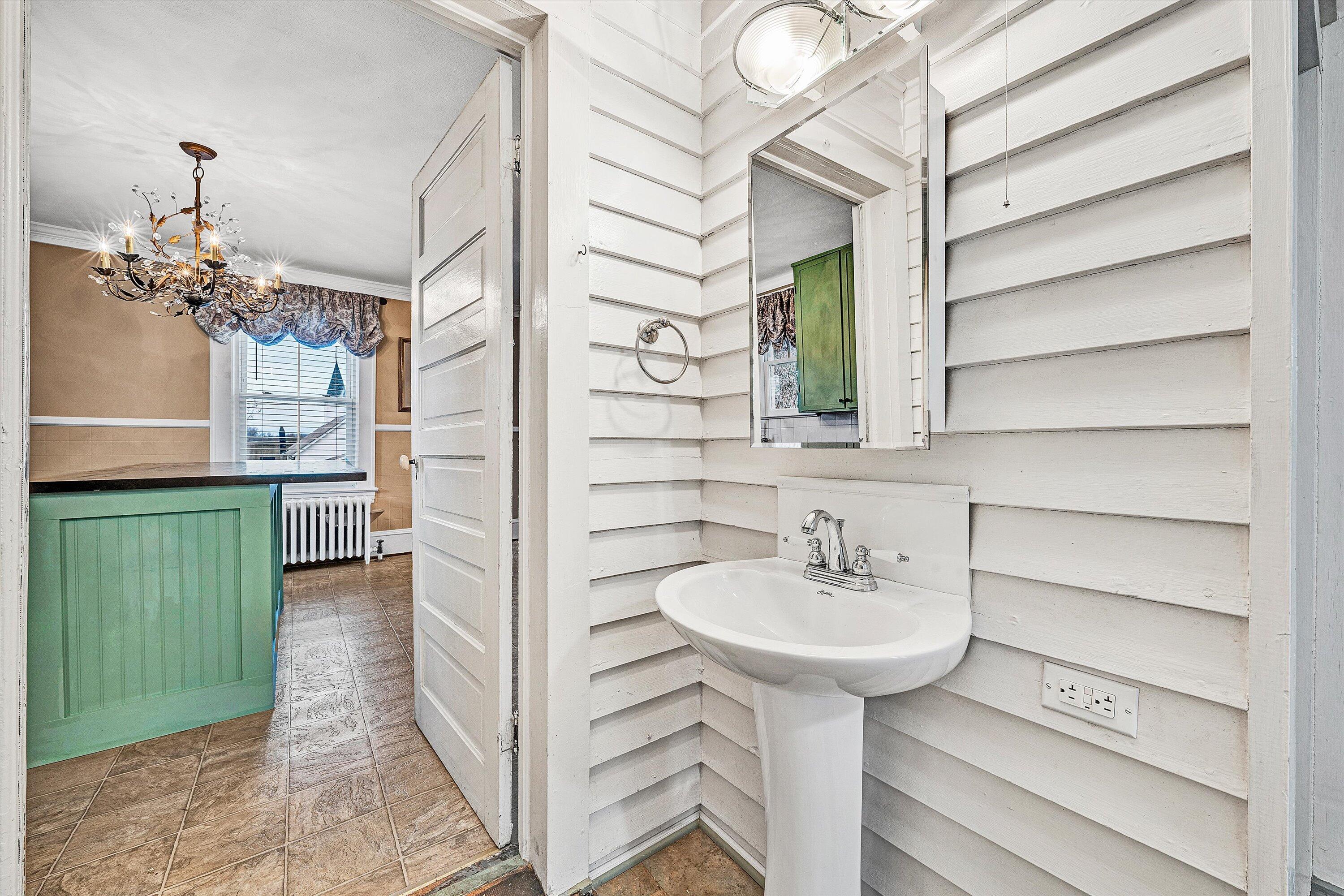 40 High Street Rocky Mount, VA 24151 - Photo 14 of 36 a bathroom with a sink and a mirror