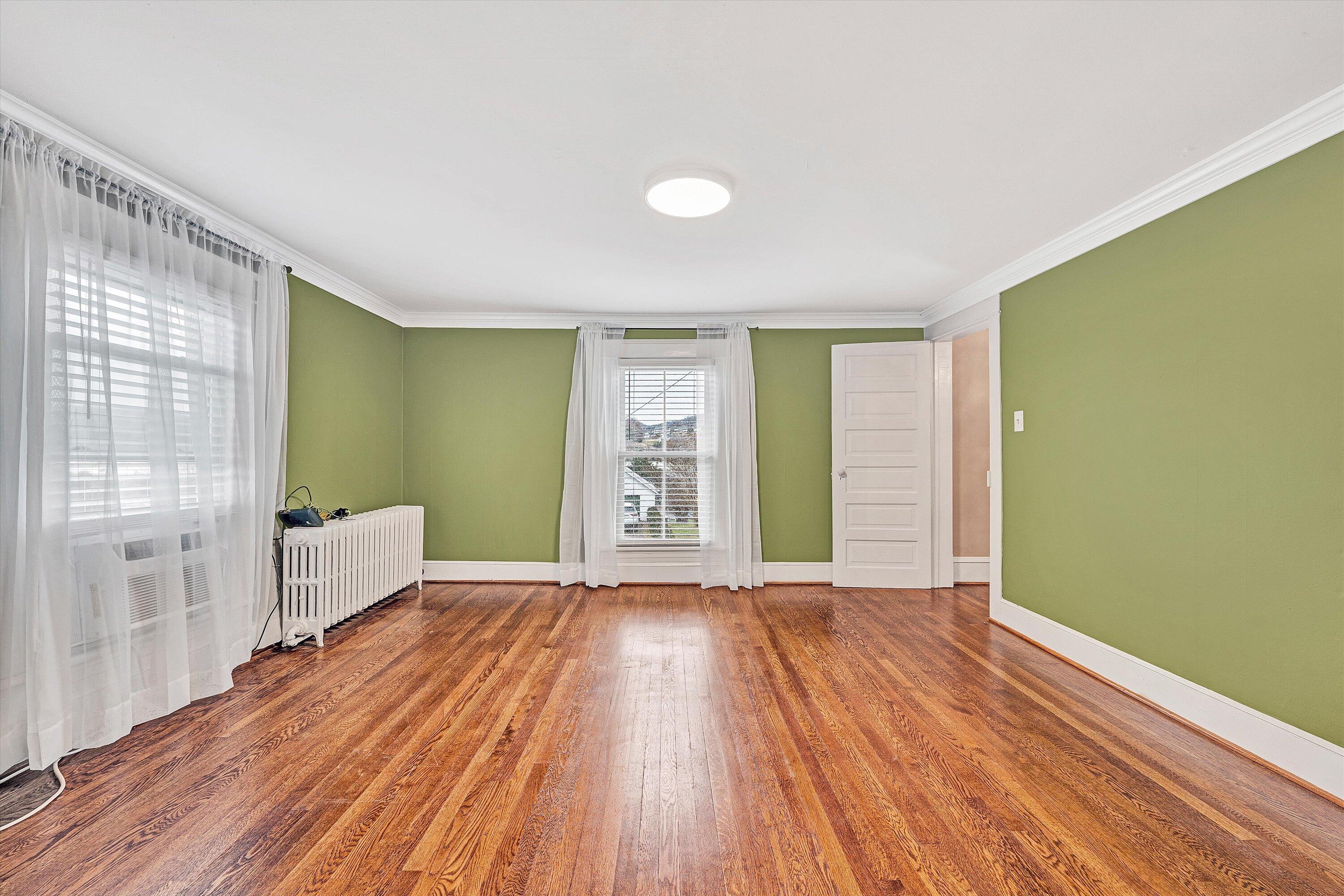 40 High Street Rocky Mount, VA 24151 - Photo 19 of 36 a view of an empty room with wooden floor and a window