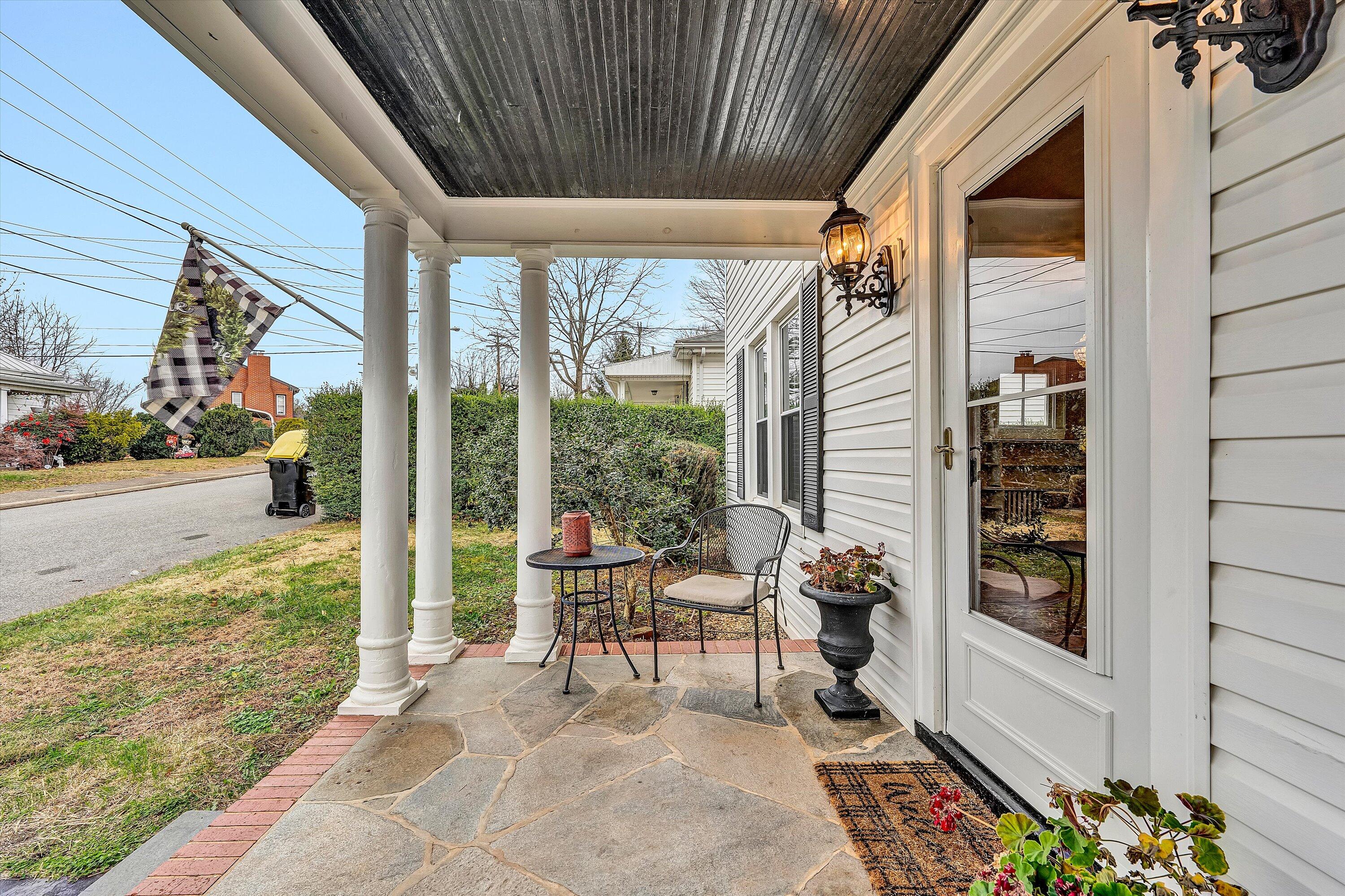 40 High Street Rocky Mount, VA 24151 - Photo 2 of 36 a view of a porch with chairs and floor to ceiling window