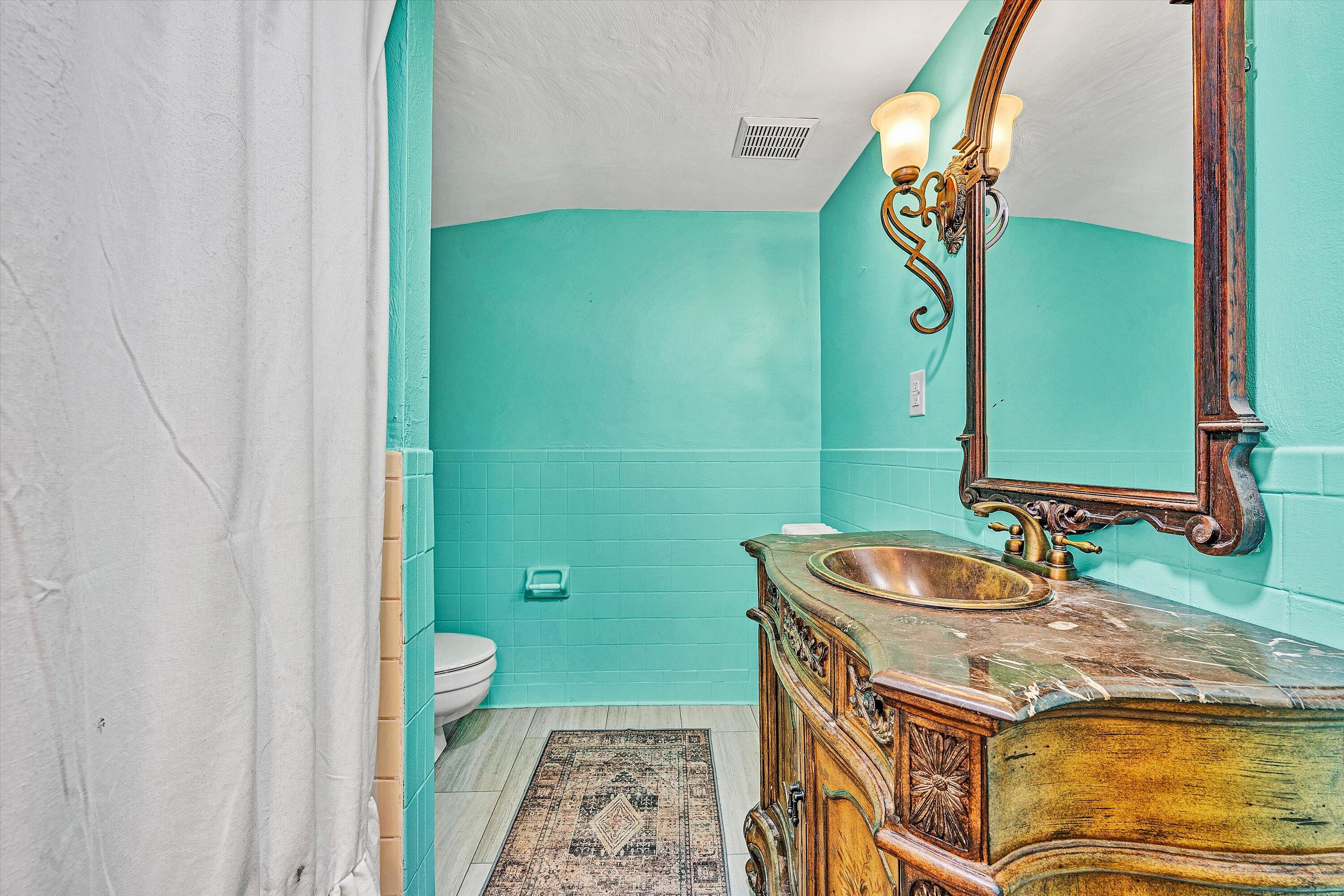 40 High Street Rocky Mount, VA 24151 - Photo 24 of 36 a bathroom with a sink and a mirror