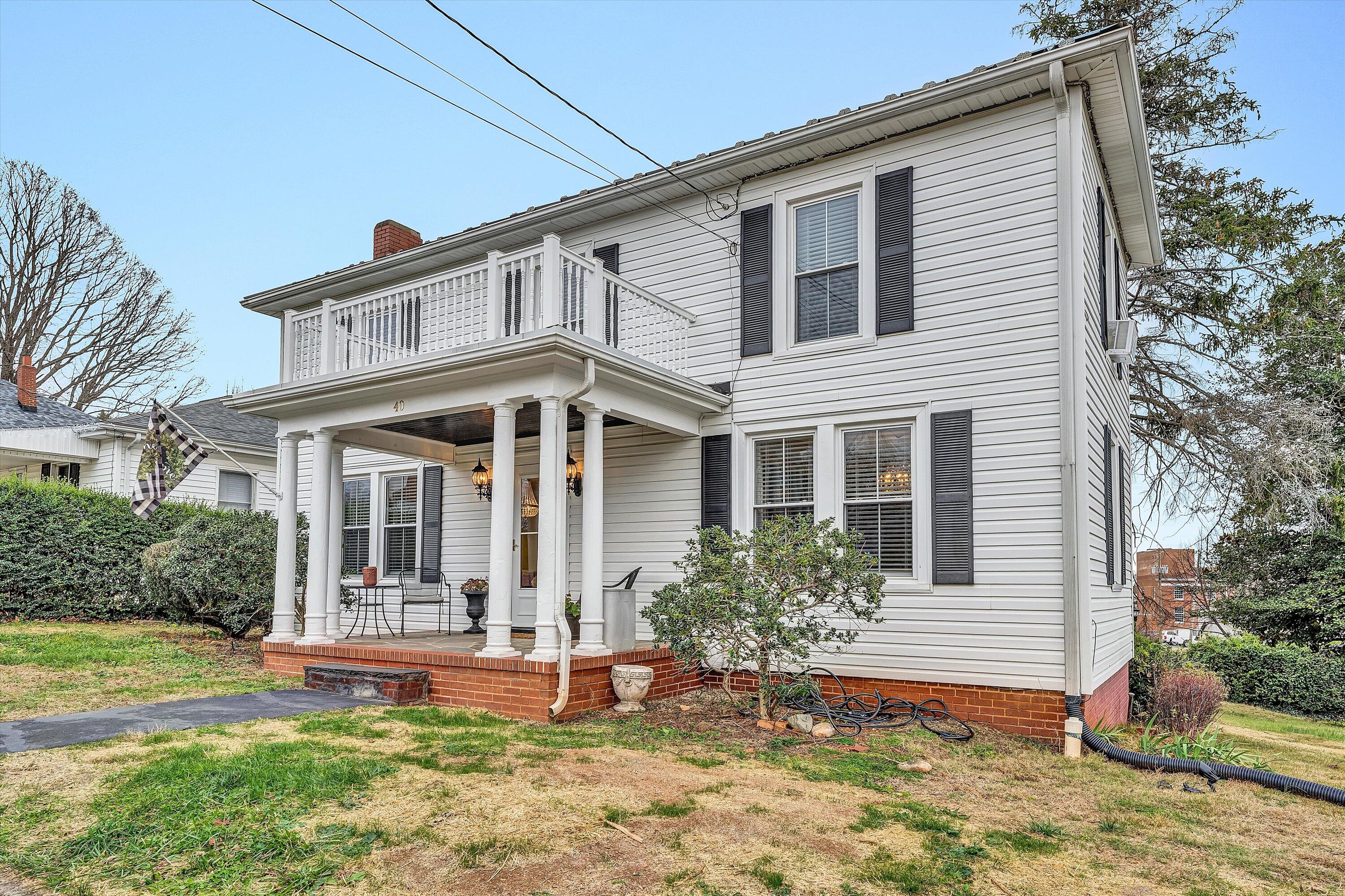 40 High Street Rocky Mount, VA 24151 - Photo 28 of 36 a front view of a house with garden