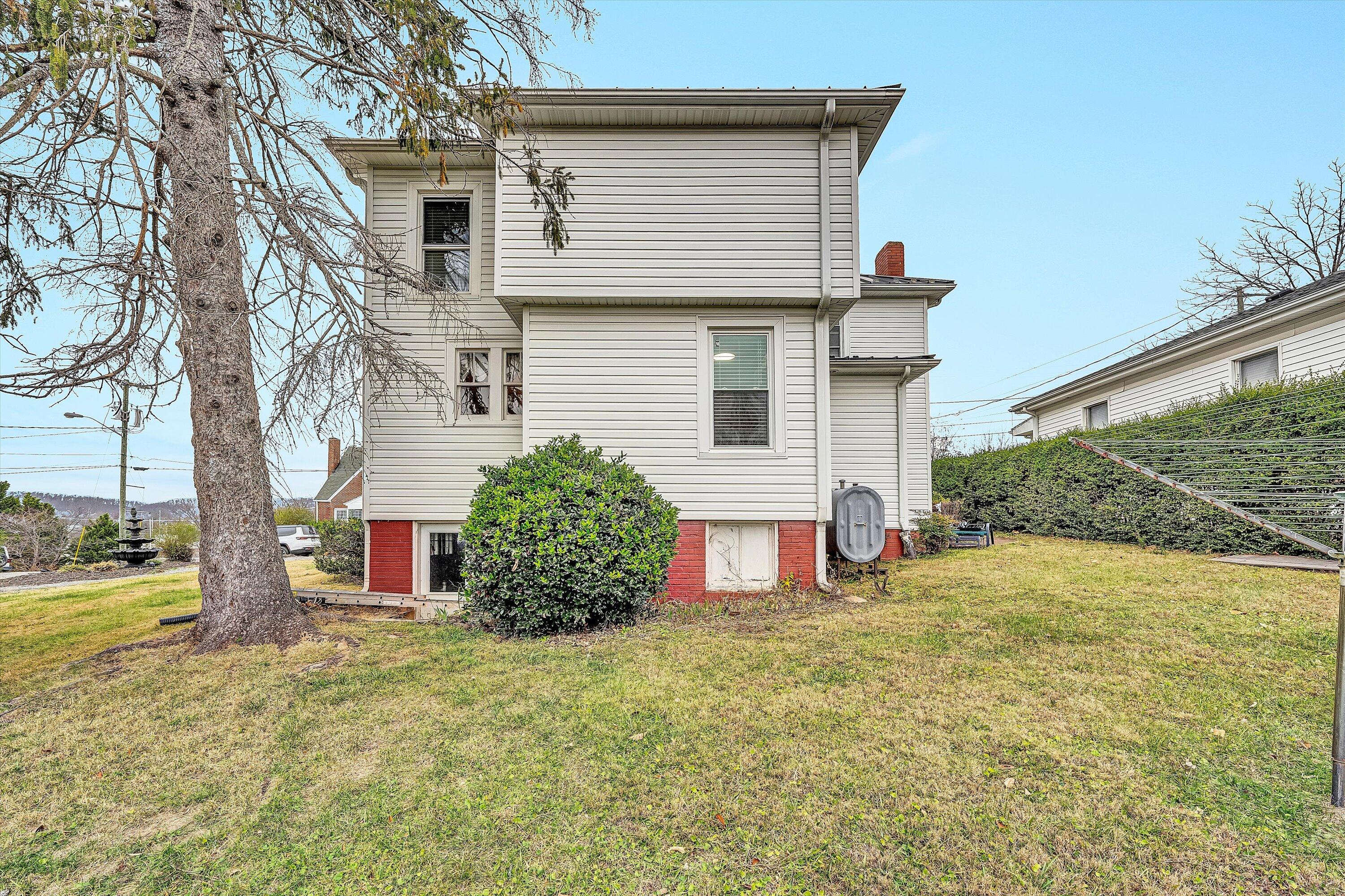 40 High Street Rocky Mount, VA 24151 - Photo 30 of 36 a view of a backyard with large tree