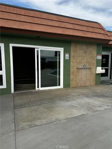 a front view of a building with entryway