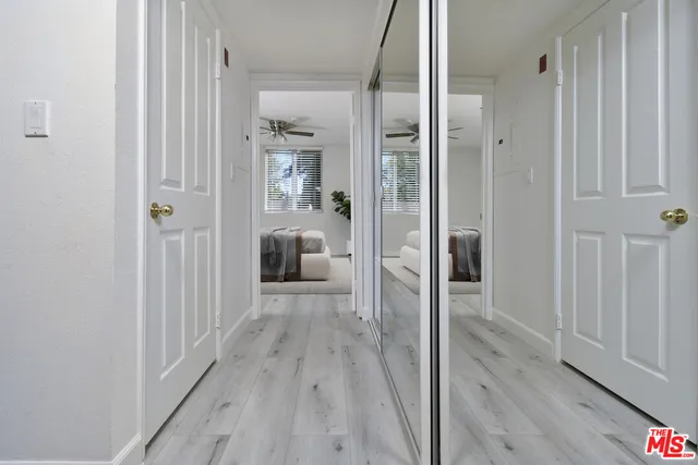 a view of a bedroom from the hallway