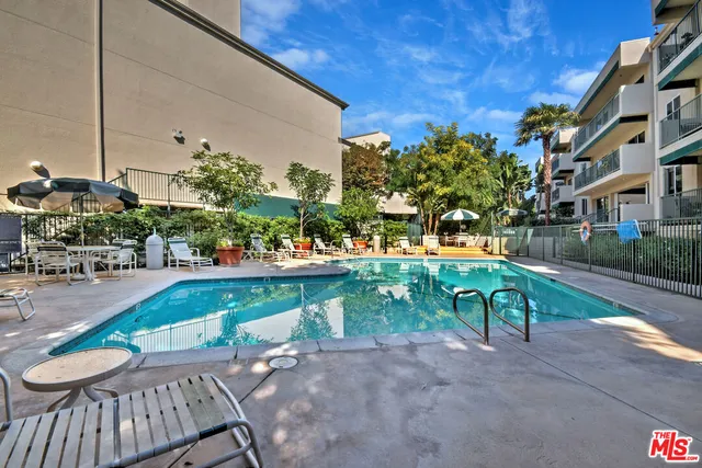 a view of a table and chairs in patio