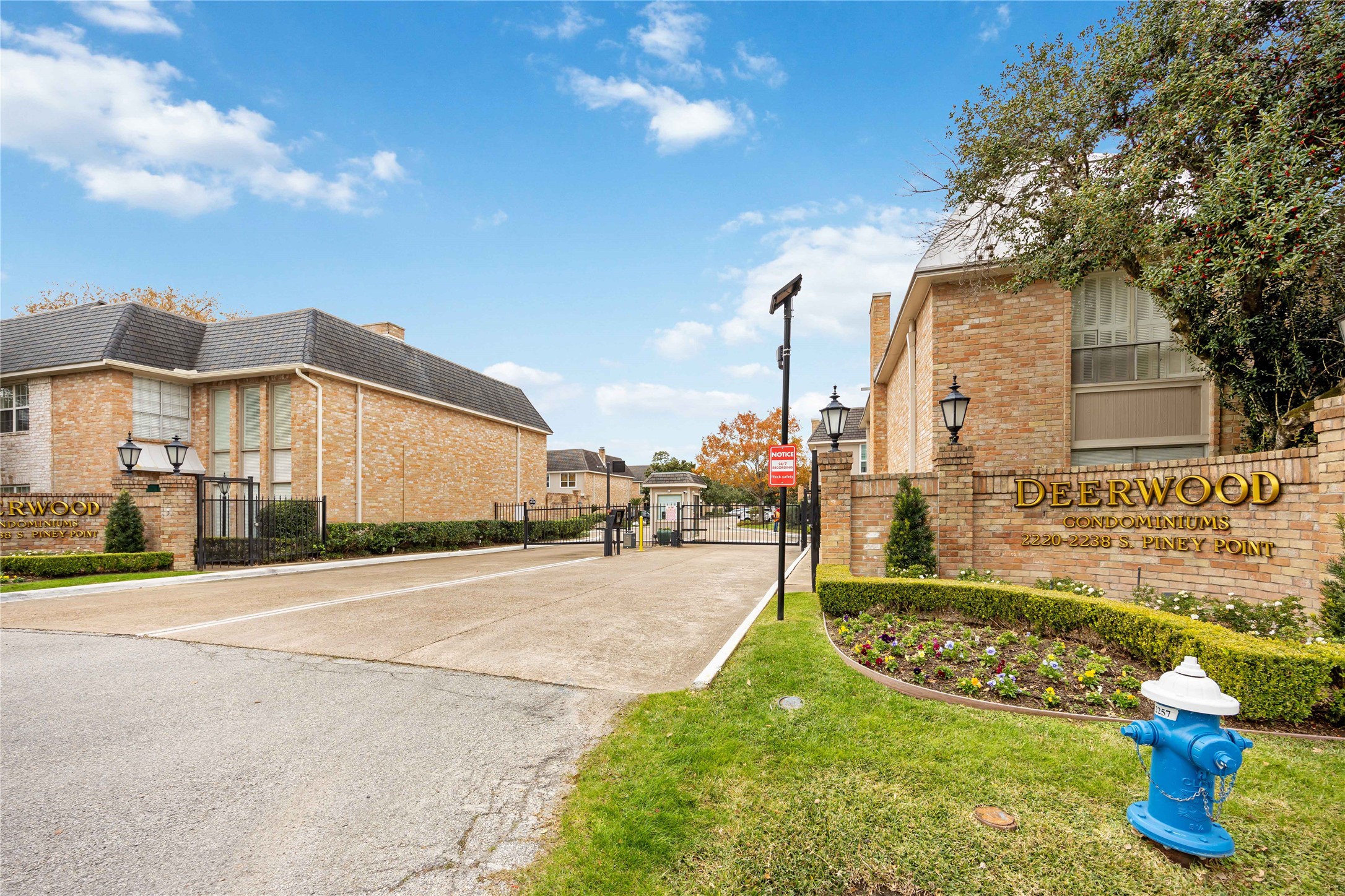 2230 South Piney Point Road, Unit 206 Houston, TX 77063 - Photo 23 of 24 Gated entrance to the property.