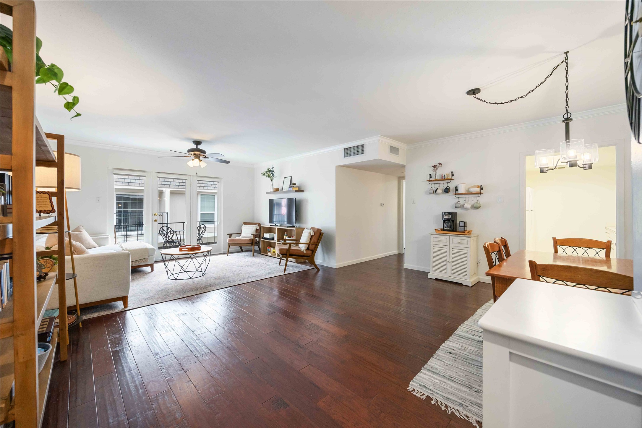 2230 South Piney Point Road, Unit 206 Houston, TX 77063 - Photo 3 of 24 Enter through the front door to an open and bright living space.