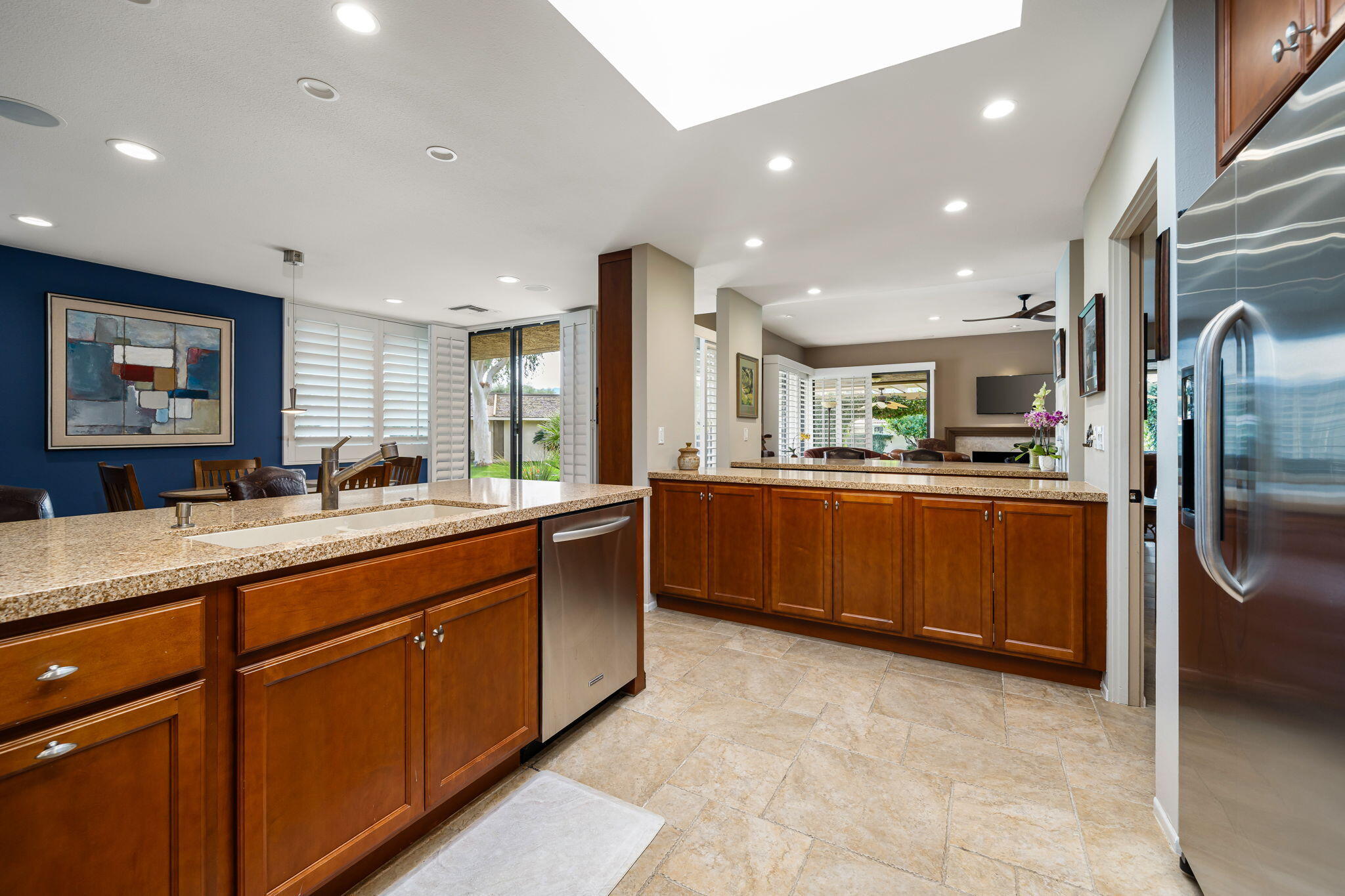 3 Tulane Court Rancho Mirage, CA 92270 - Photo 18 of 47 a kitchen with stainless steel appliances granite countertop a refrigerator and a sink