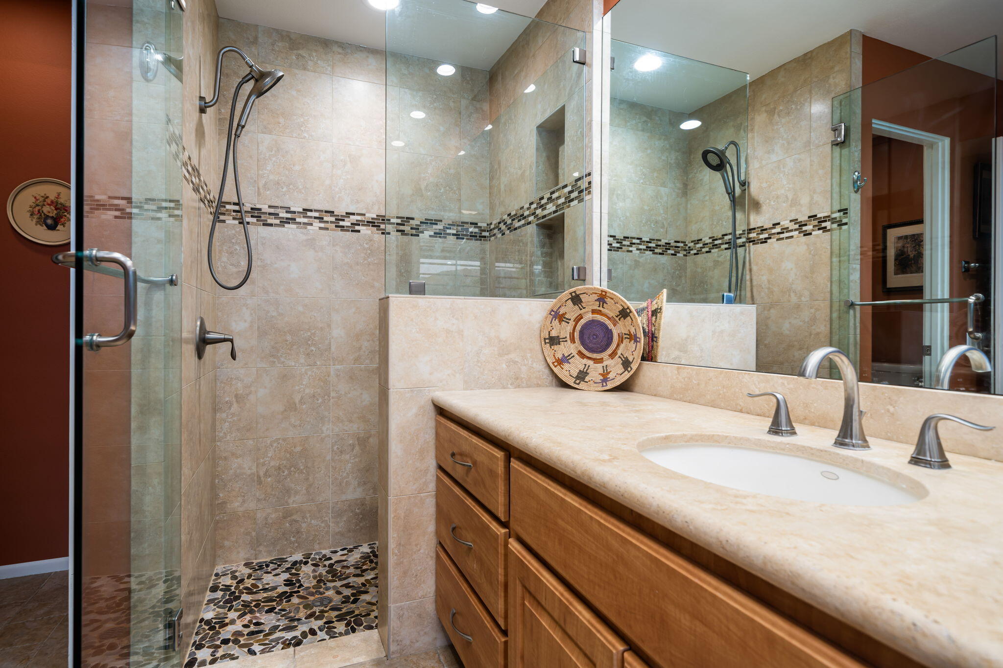 3 Tulane Court Rancho Mirage, CA 92270 - Photo 24 of 47 a bathroom with a granite countertop sink a shower and a mirror