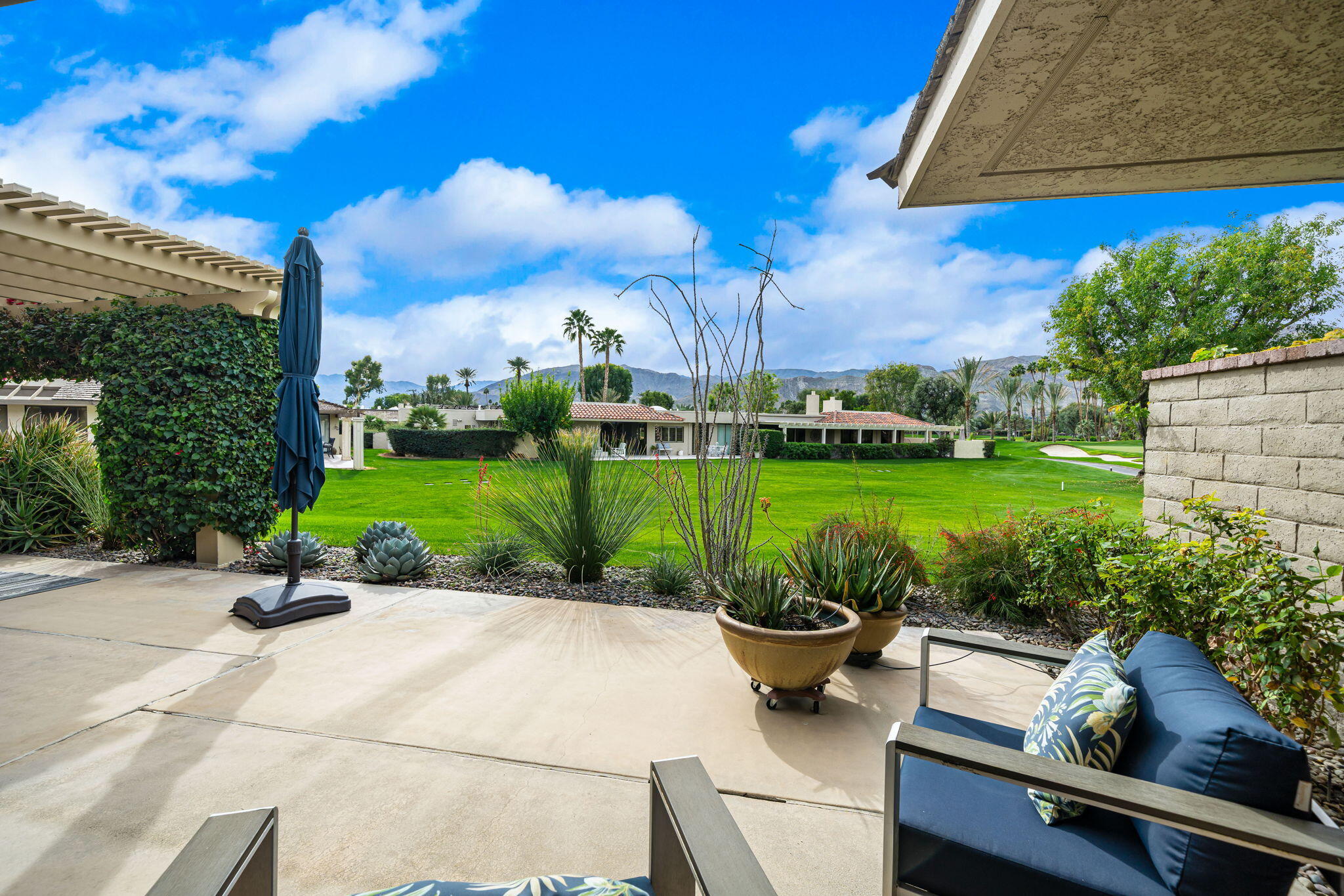 3 Tulane Court Rancho Mirage, CA 92270 - Photo 25 of 47 a garden view with a seating space