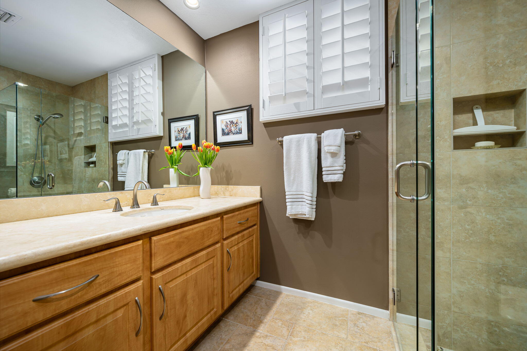 3 Tulane Court Rancho Mirage, CA 92270 - Photo 29 of 47 a bathroom with a sink and a mirror