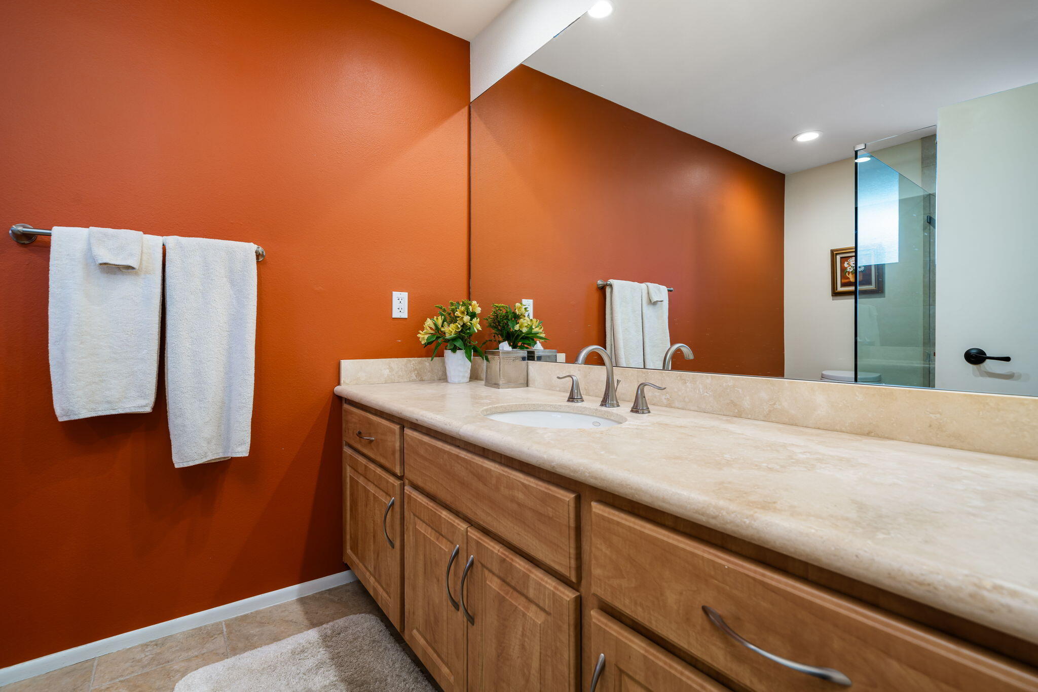 3 Tulane Court Rancho Mirage, CA 92270 - Photo 33 of 47 a bathroom with a sink and a mirror