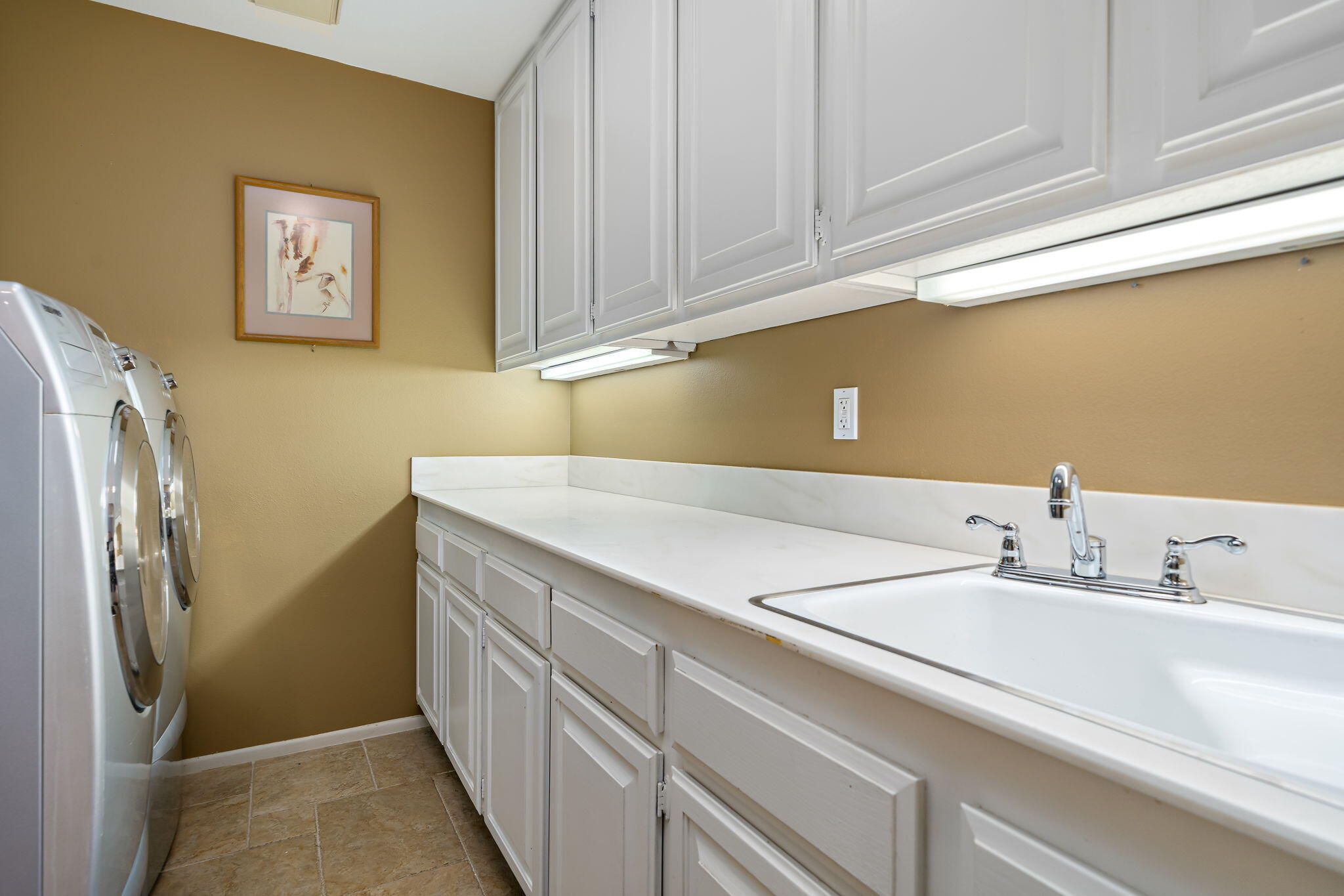 3 Tulane Court Rancho Mirage, CA 92270 - Photo 34 of 47 a bathroom with a sink and a mirror