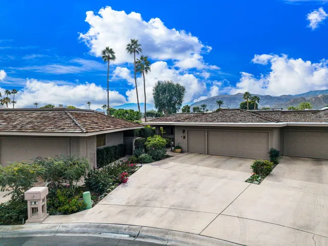 a aerial view of a house with a garden