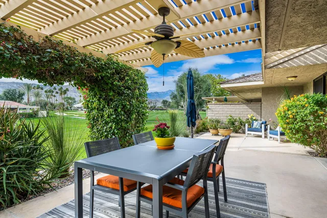 a outdoor space with patio the couches and a potted plant