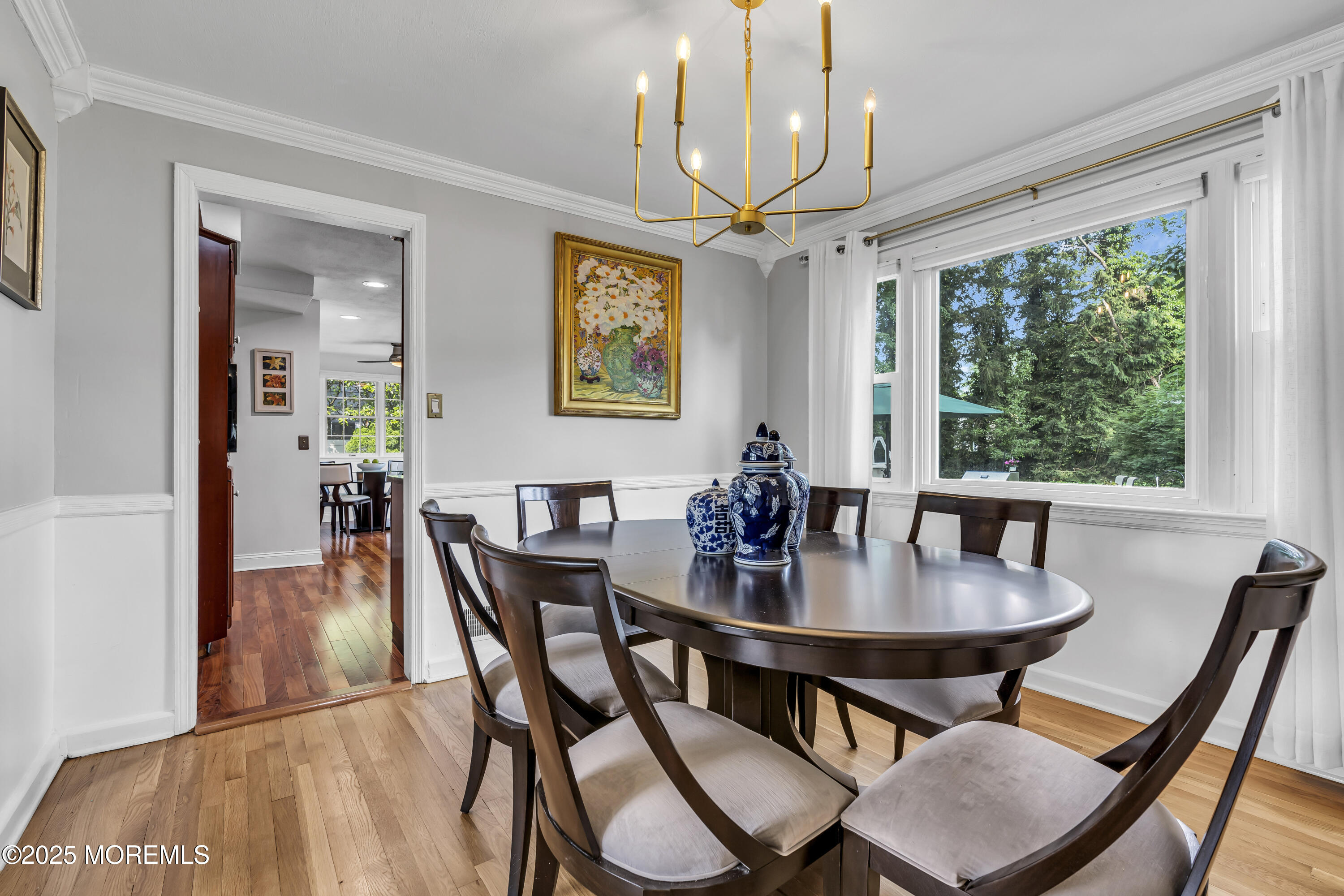 82 Ridge Road Fair Haven, NJ 07704 - Photo 11 of 39 a view of a dining room with furniture window and wooden floor