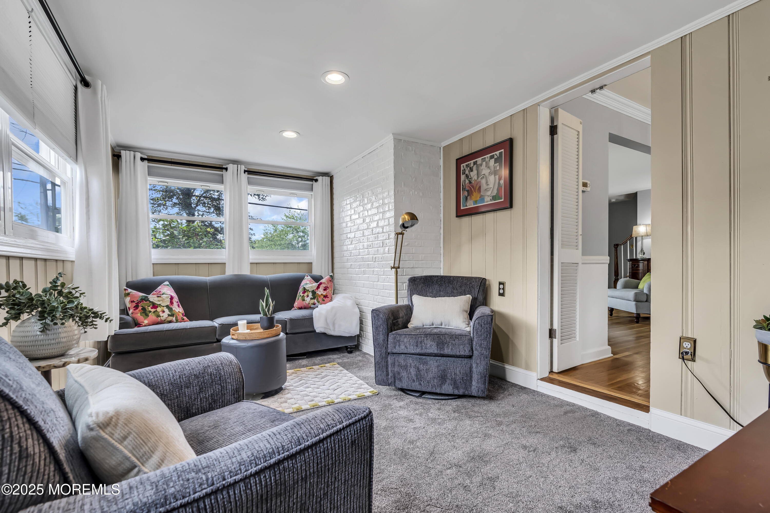 82 Ridge Road Fair Haven, NJ 07704 - Photo 12 of 39 a living room with furniture and a potted plant