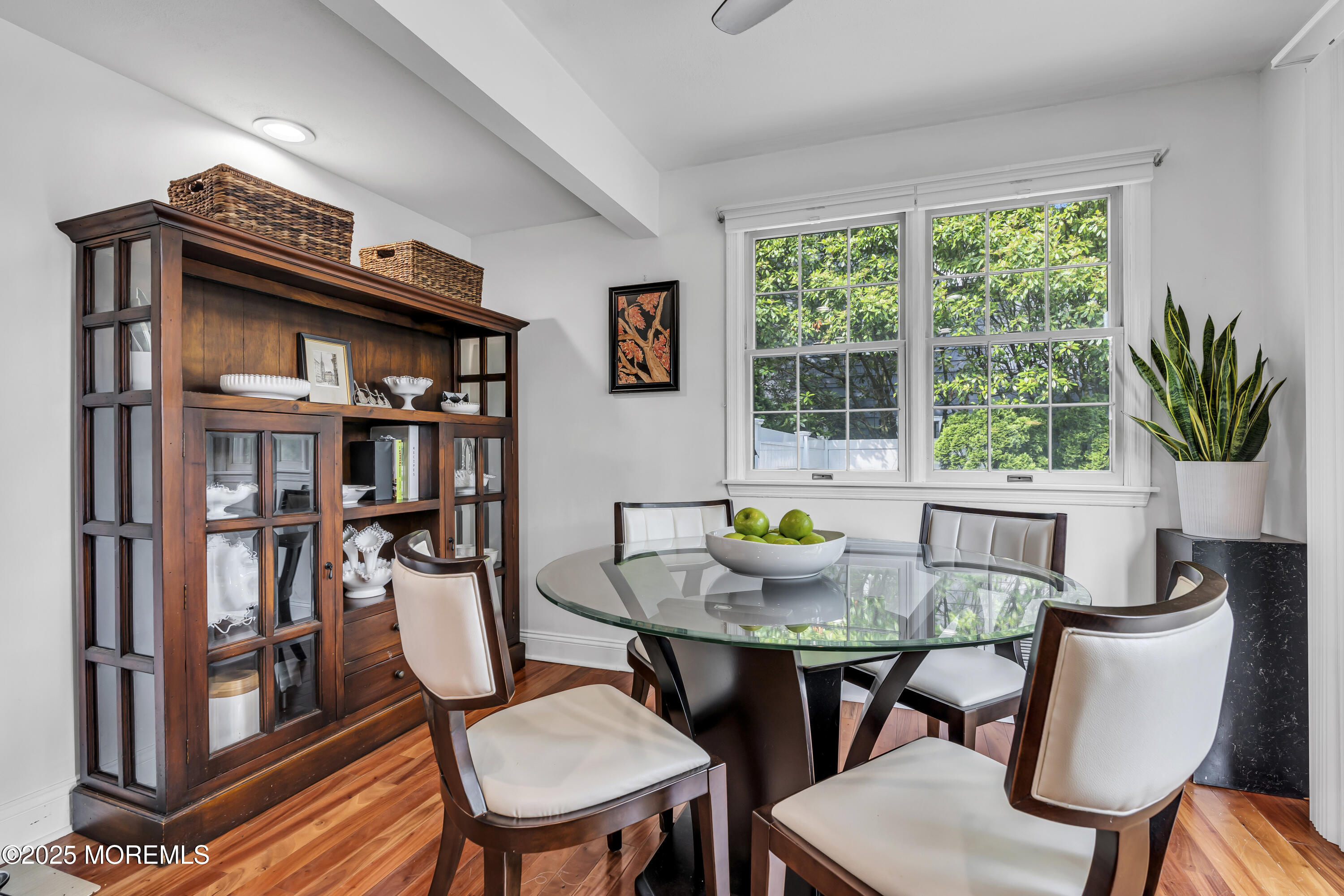 82 Ridge Road Fair Haven, NJ 07704 - Photo 17 of 39 a view of a dining room with furniture window and wooden floor