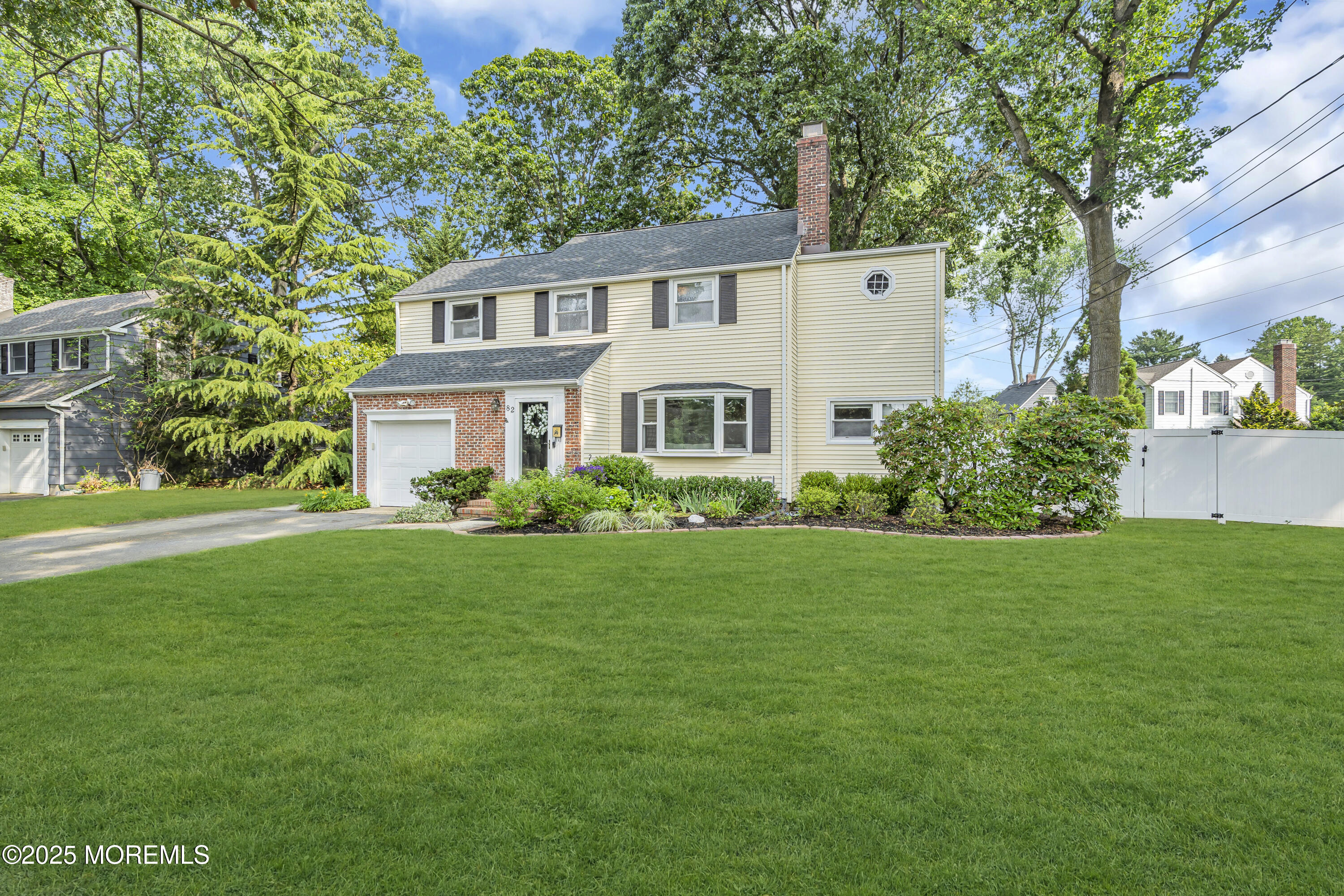 82 Ridge Road Fair Haven, NJ 07704 - Photo 2 of 39 a house view with a garden space