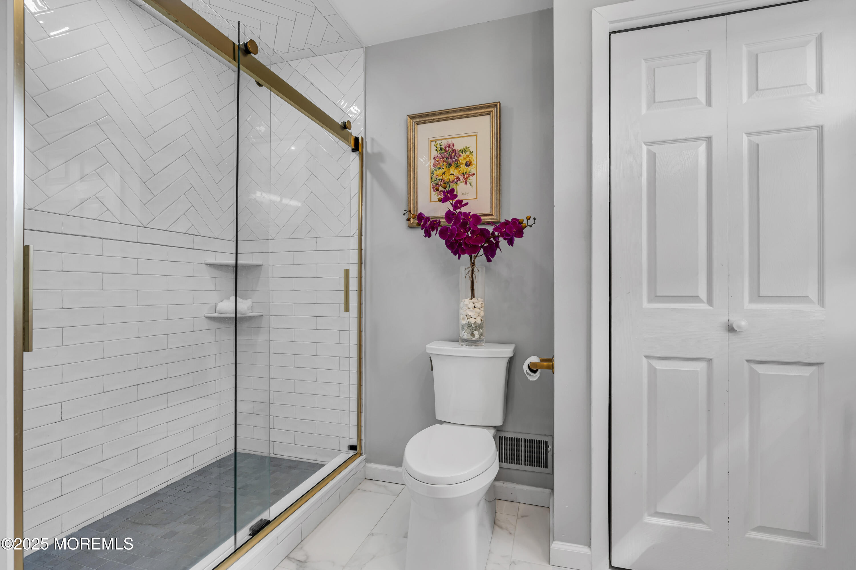 82 Ridge Road Fair Haven, NJ 07704 - Photo 25 of 39 a bathroom with a toilet and a shower