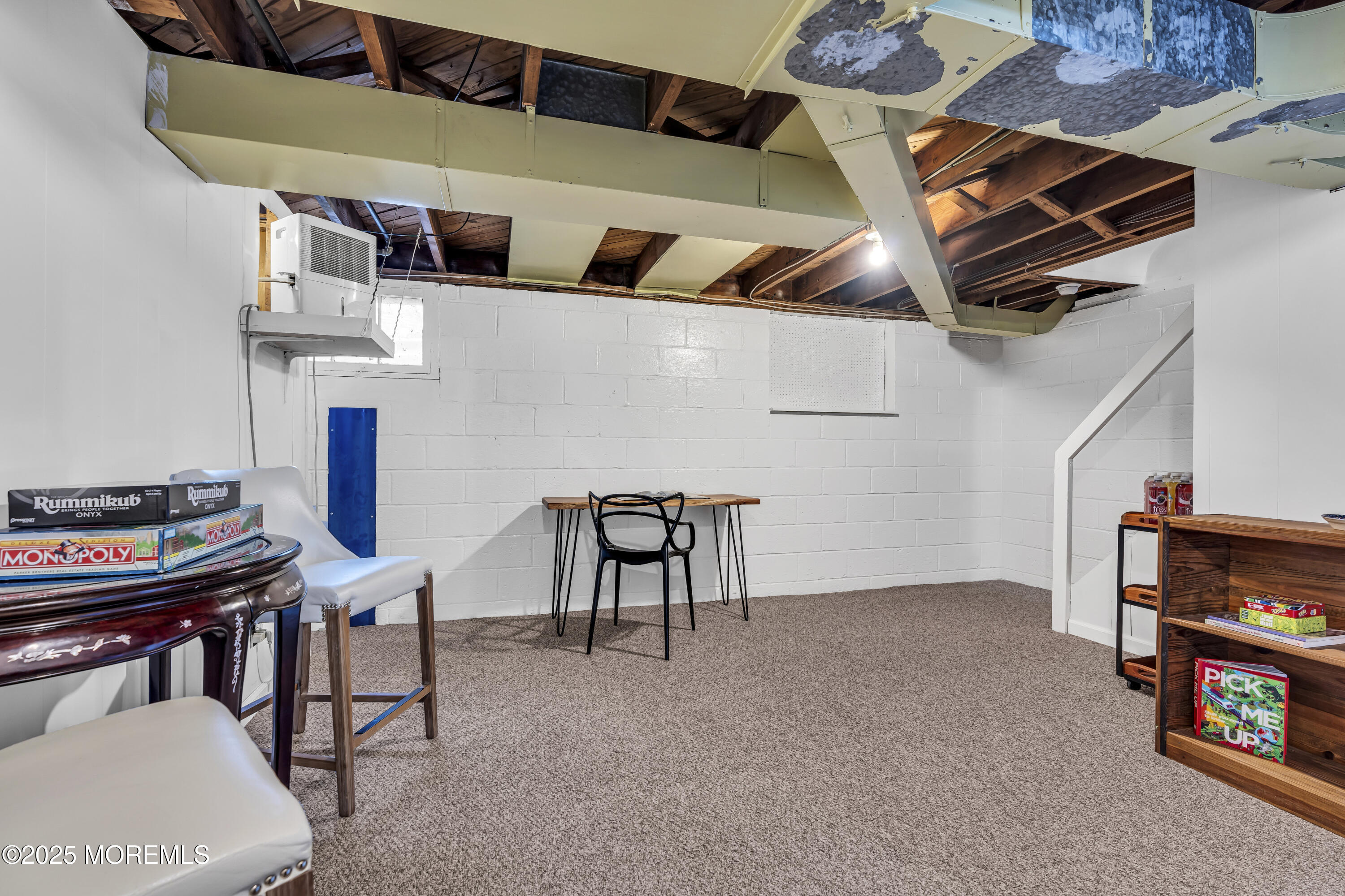 82 Ridge Road Fair Haven, NJ 07704 - Photo 32 of 39 a room with furniture and a fireplace