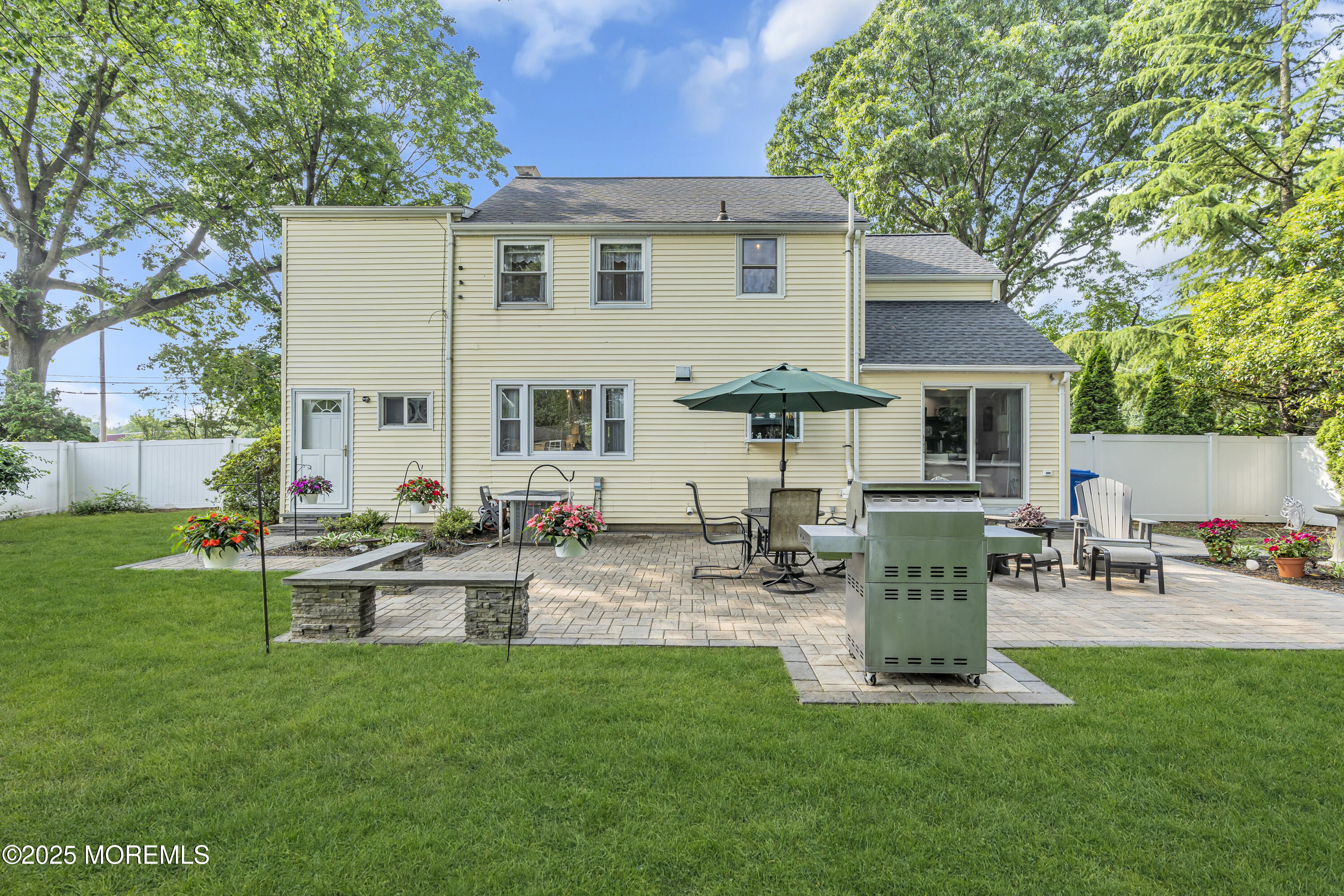 82 Ridge Road Fair Haven, NJ 07704 - Photo 39 of 39 a front view of house with a garden and patio