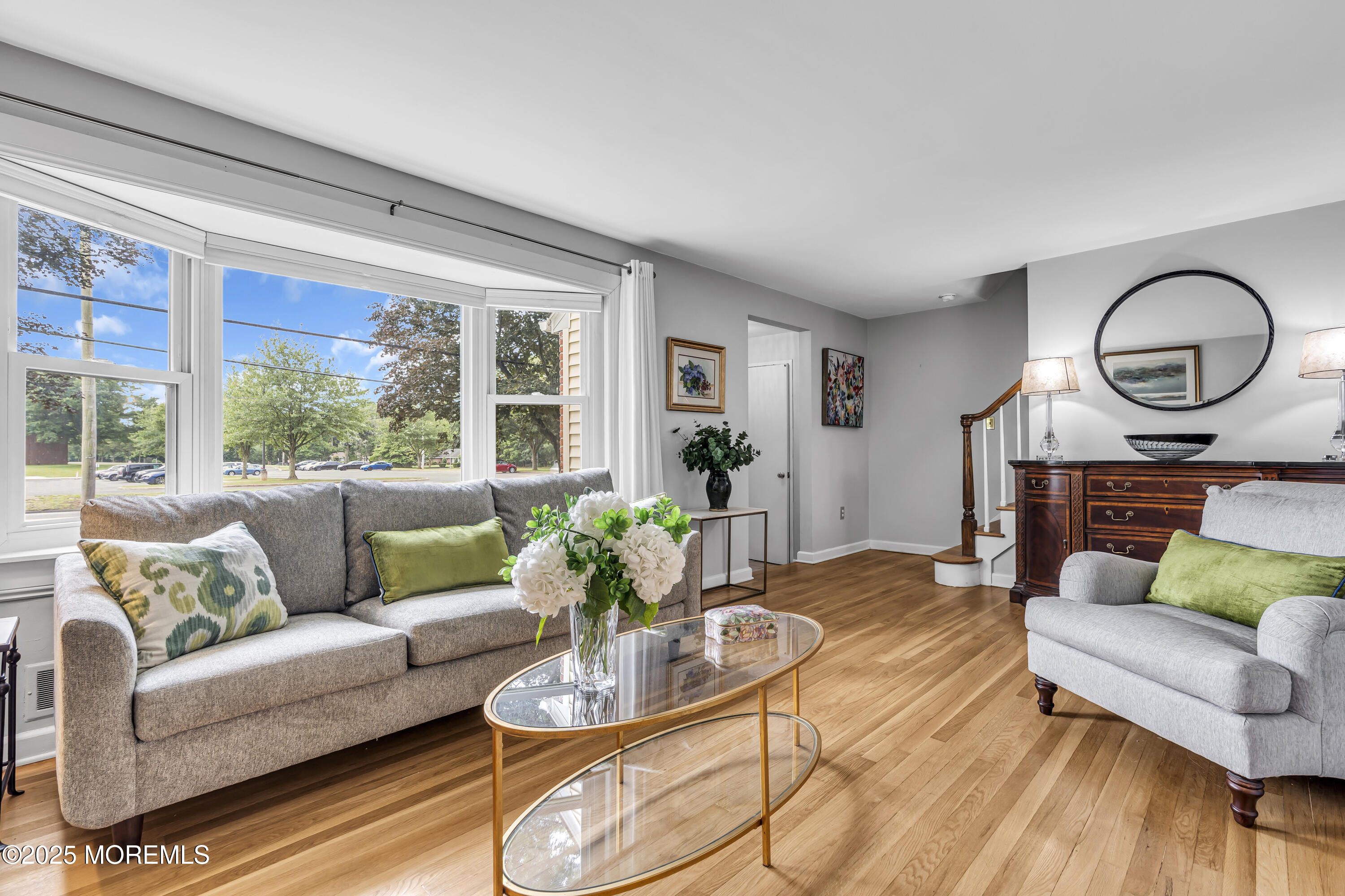 82 Ridge Road Fair Haven, NJ 07704 - Photo 8 of 39 a living room with furniture and a large window