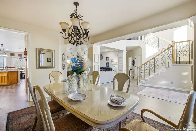 a living room with furniture fireplace and flat screen tv