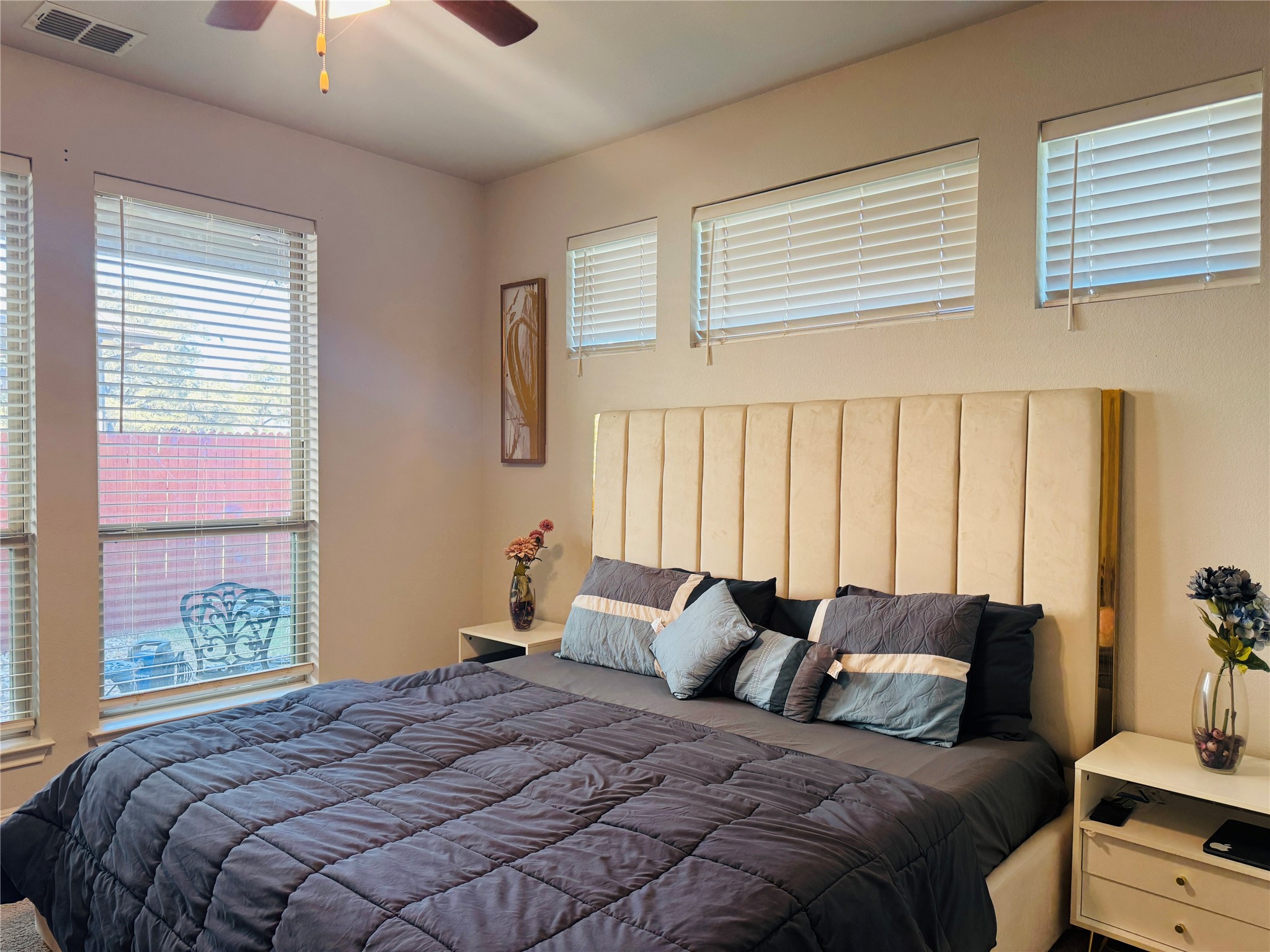 349 Rend Drive Leander, TX 78641 - Photo 18 of 21 Bedroom with multiple windows and ceiling fan