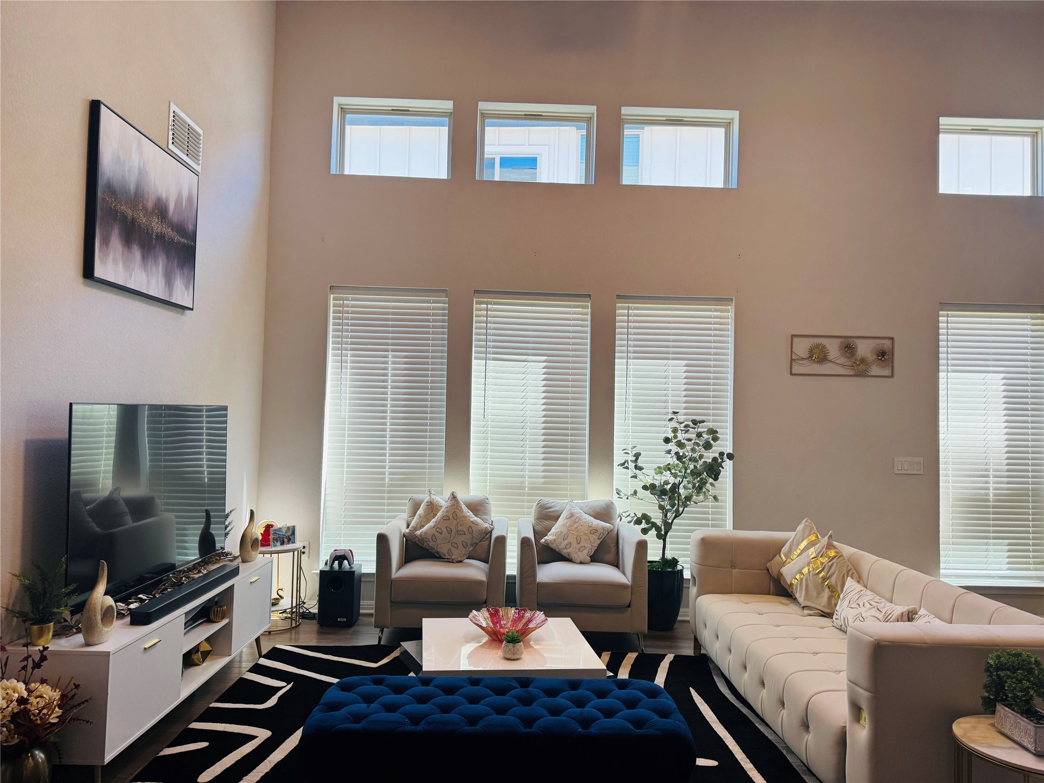 349 Rend Drive Leander, TX 78641 - Photo 3 of 21 Living room with wood finished floors and a high ceiling