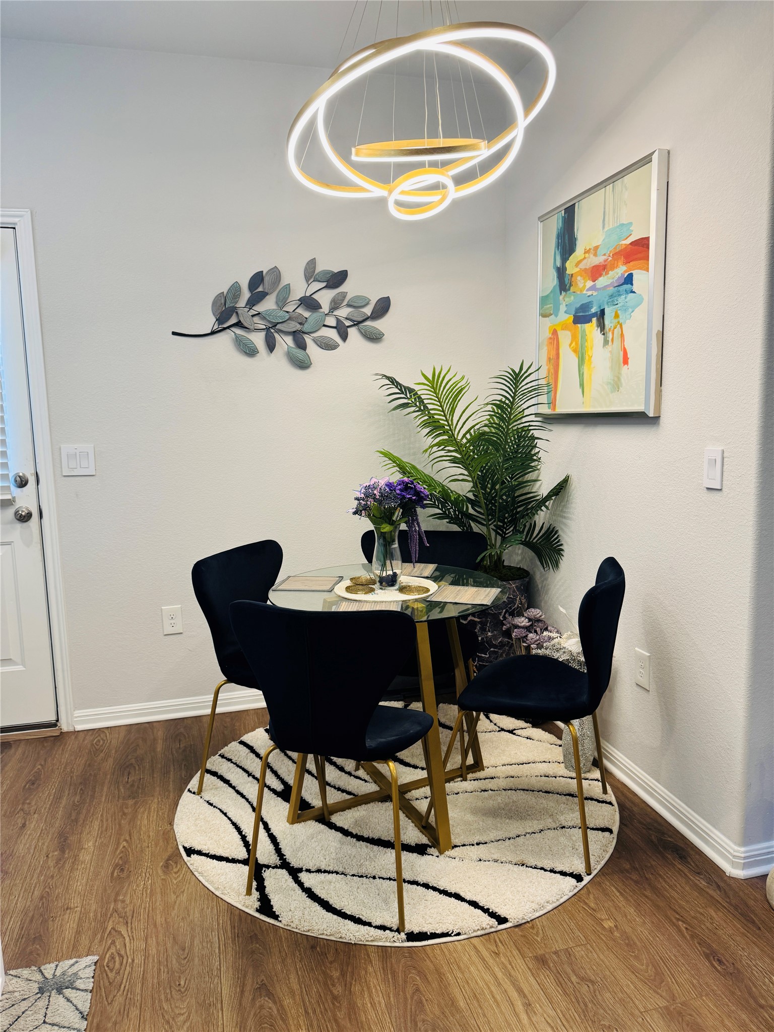 349 Rend Drive Leander, TX 78641 - Photo 10 of 21 Dining room featuring wood finished floors and hanging lights