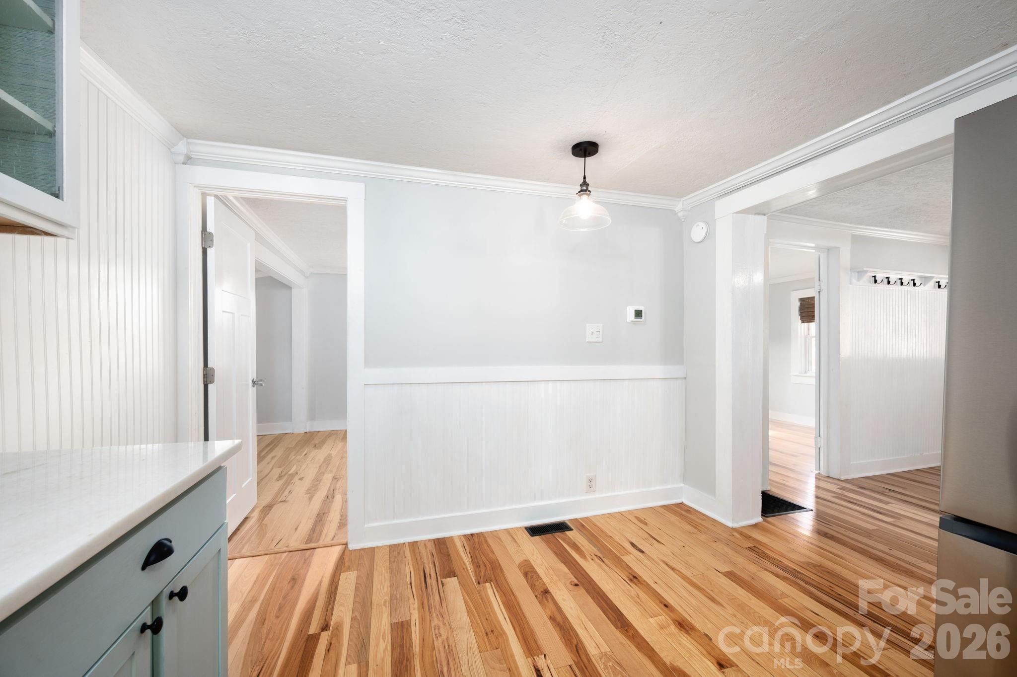 127 Shelburne Road Asheville, NC 28806 - Photo 13 of 28 a view of a room with wooden floor and a sink