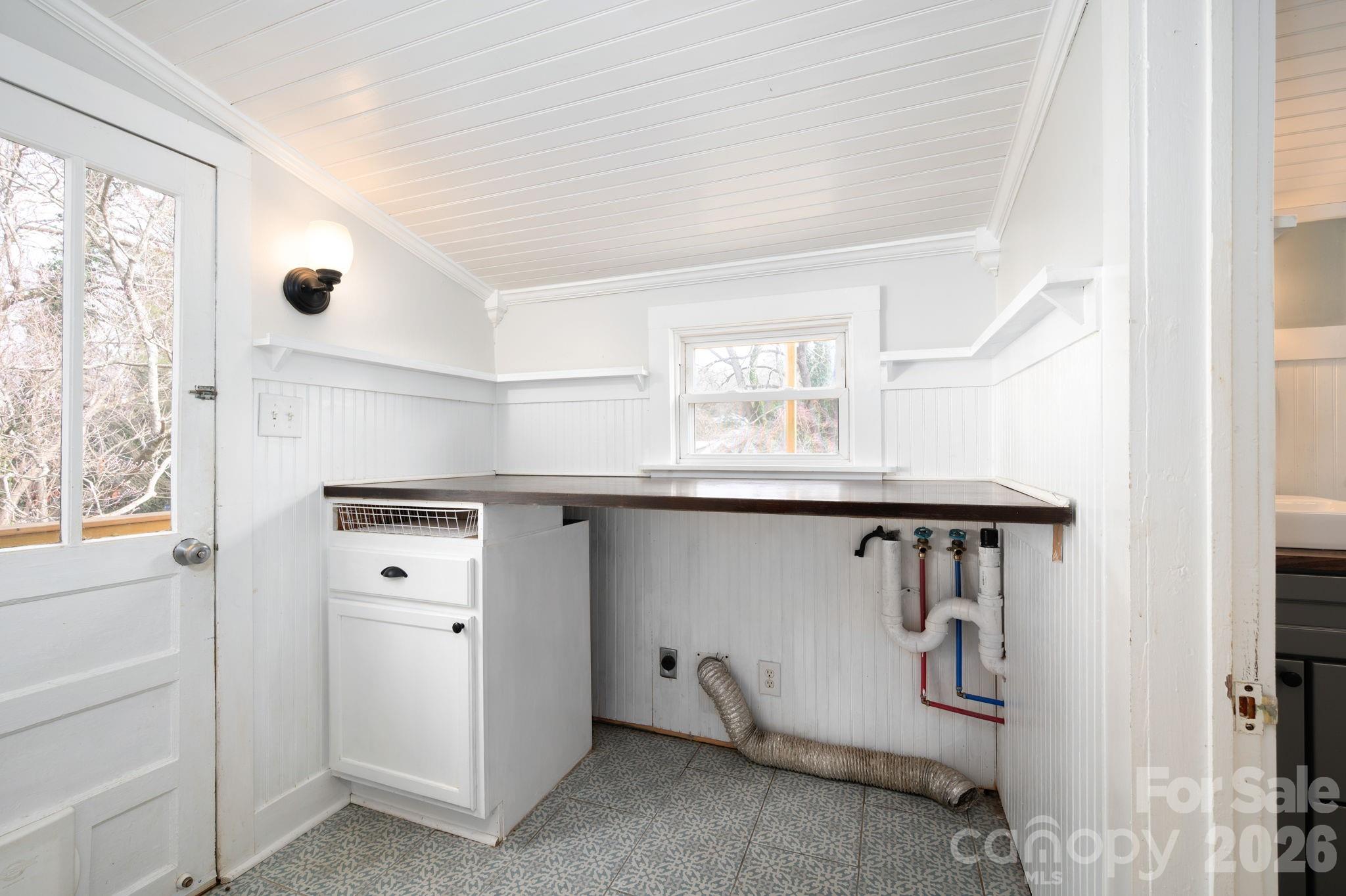 127 Shelburne Road Asheville, NC 28806 - Photo 18 of 28 a room with a door and a window