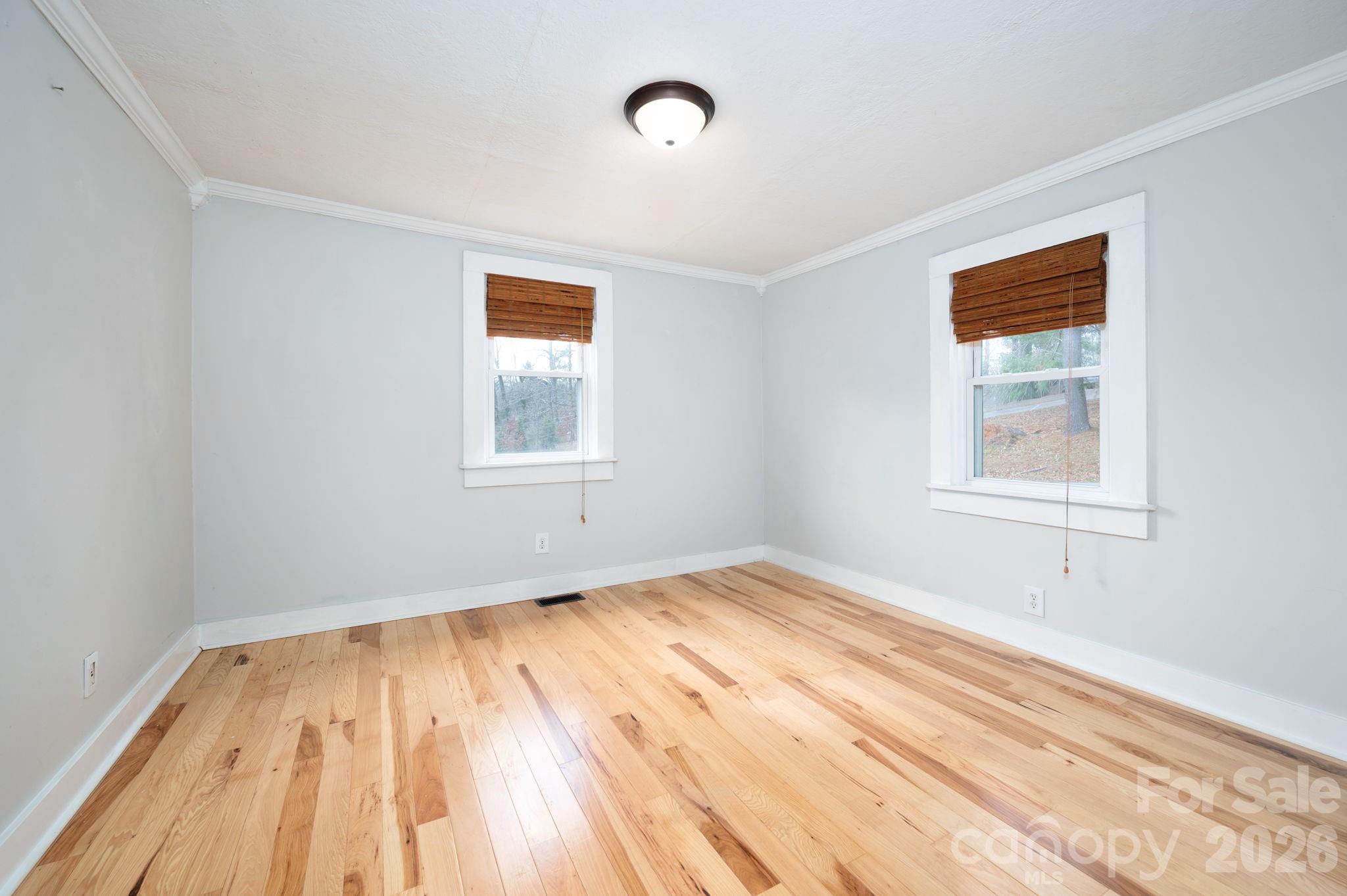 127 Shelburne Road Asheville, NC 28806 - Photo 20 of 28 a view of empty room with wooden floor